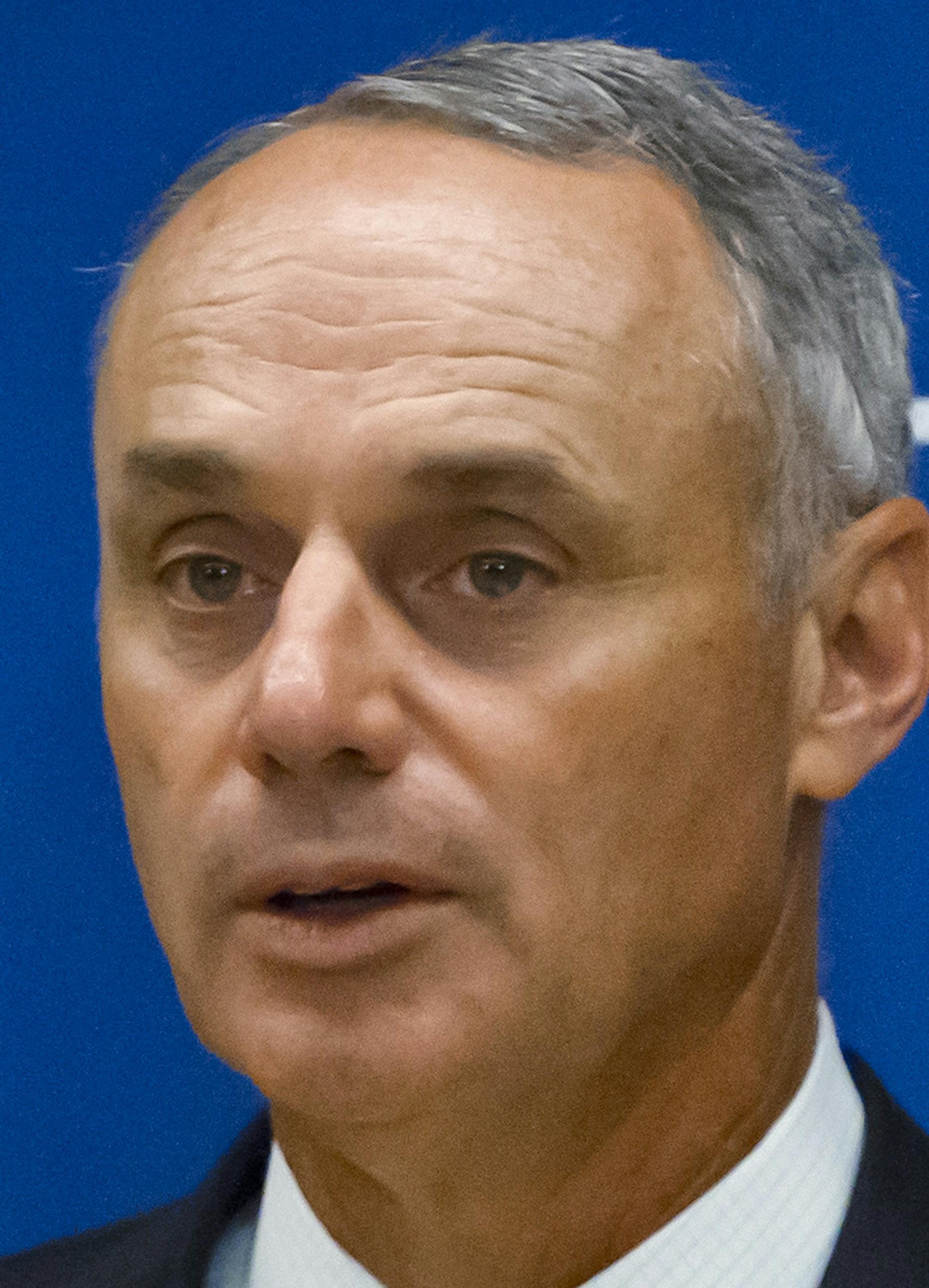 FILE - In this May 21, 2015, file photo, baseball Commissioner Rob Manfred speaks during a news conference in New York. Pete Rose has made his case for reinstatement with Commissioner Rob Manfred, who promised a decision by the end of December. Major League Baseball said the meeting with the career hits leader and his representatives took place Thursday, Sept. 24, 2015, at baseball's headquarters in New York. "Commissioner Manfred informed Mr. Rose that he will make a decision on his application