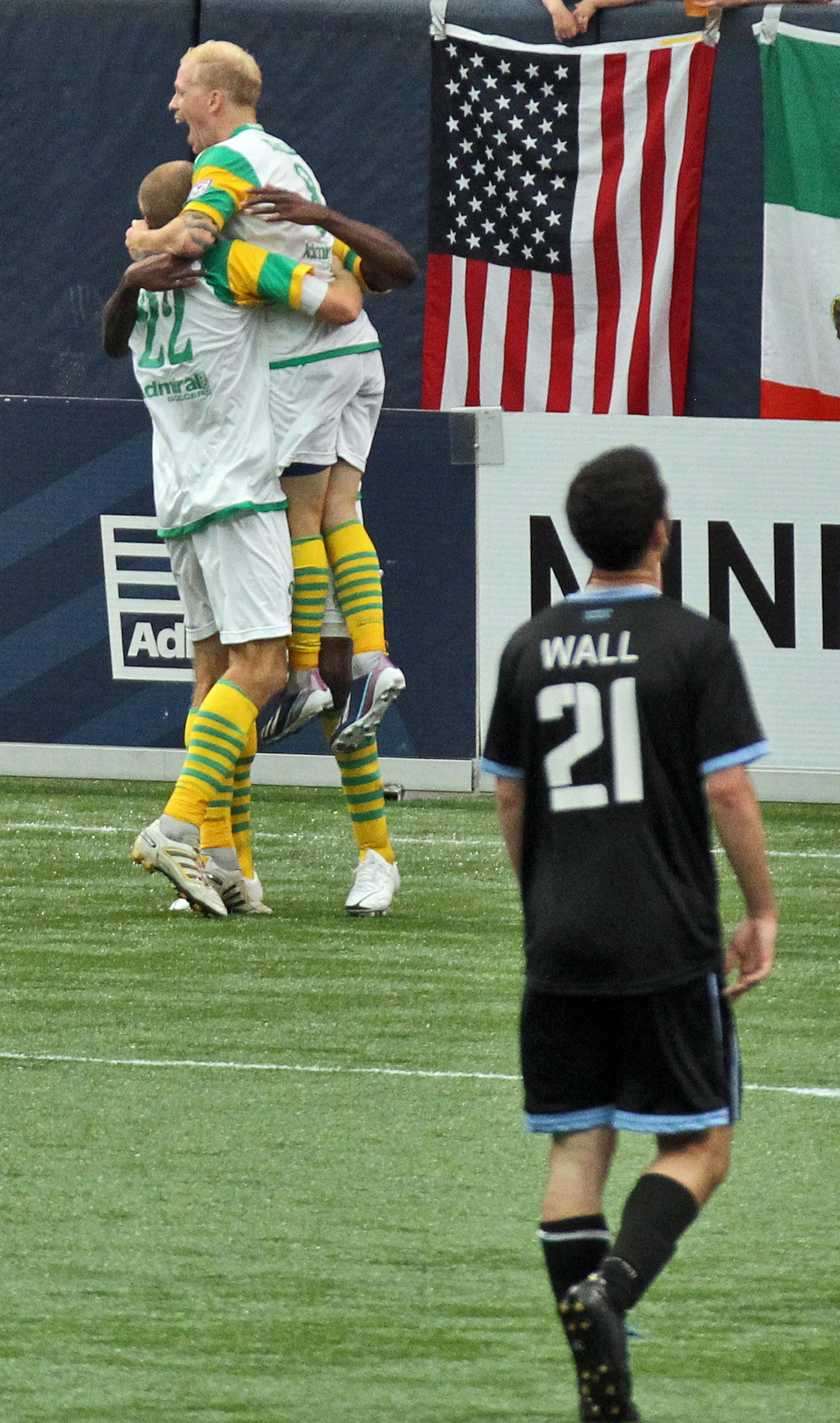 Tampa Bay players celebrated after a late goal gave the Rowdies a 3-2 win over Minnesota United FC at the Metrodome.