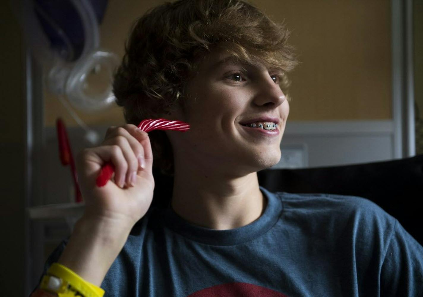 Daniel Fleigle ate Twizzlers in his hospital room with his friends after a press conference held at the hospital on Monday.