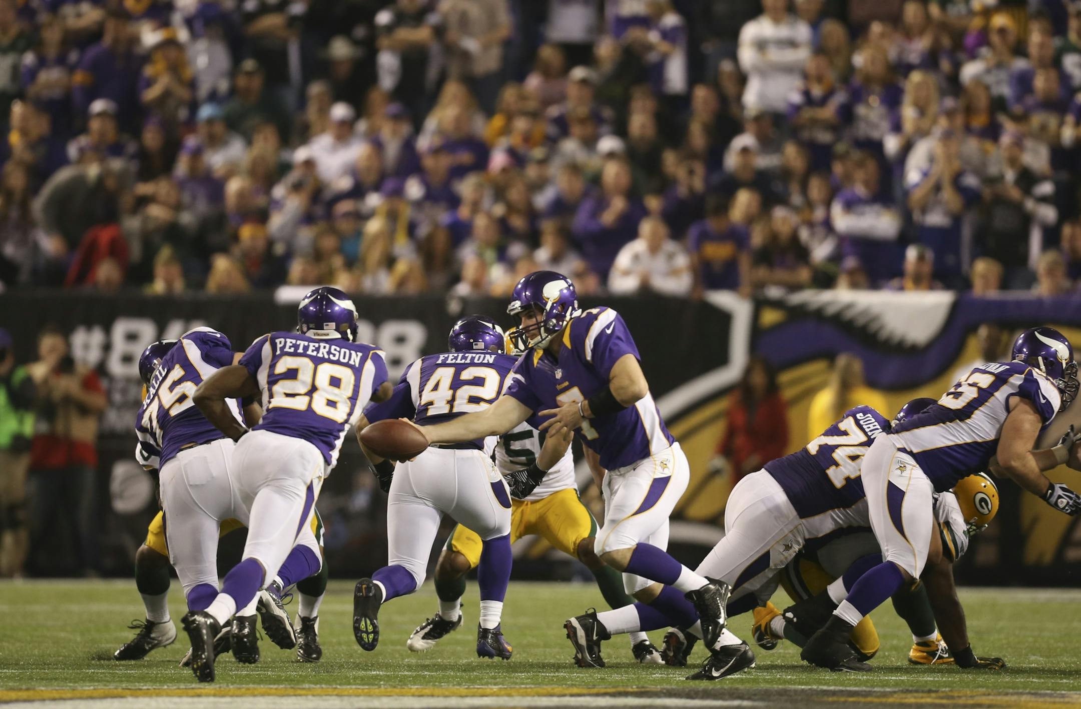 Adrian Peterson took his final handoff of the game from quarterback Christian Ponder late in the fourth quarter against the Packers. He gained 26 yards on the run, setting up the winning field goal.