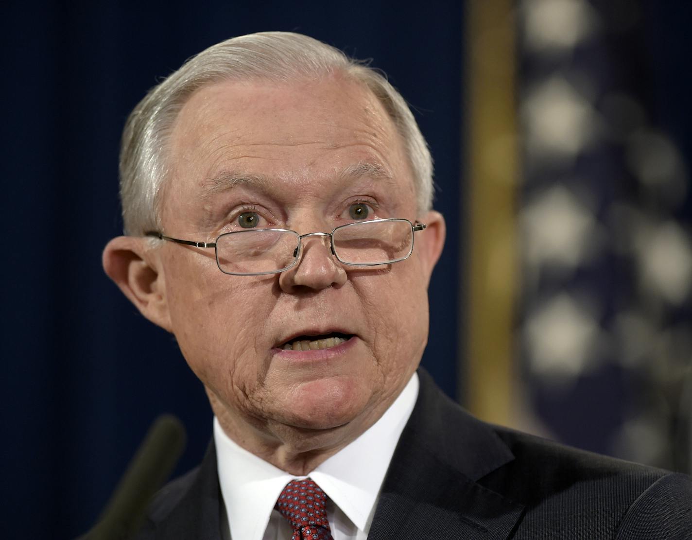 FILE - In this Sept. 5, 2017 file photo, Attorney General Jeff Sessions makes a statement at the Justice Department in Washington. Sessions said Thursday he is reviving a Bush era crime-fighting strategy that emphasizes aggressive prosecution of gun and gang crimes. (AP Photo/Susan Walsh)