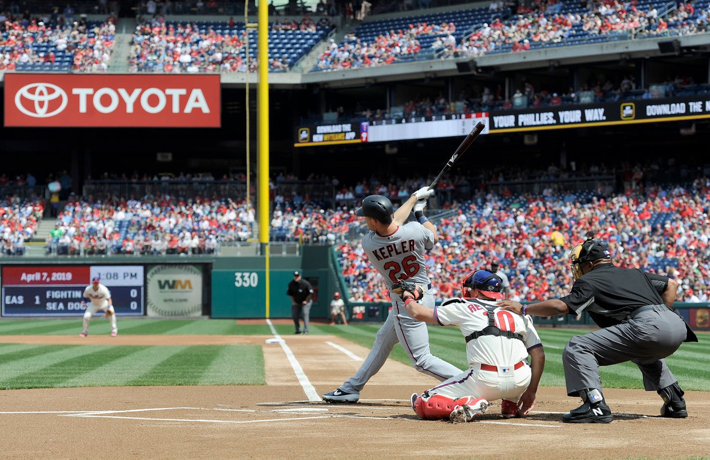 Minnesota Twins' Max Kepler (26) hits a solo home run first inning of a baseball game against the Philadelphia Phillies, Sunday, April 7, 2019, in Philadelphia. (AP Photo/Michael Perez)