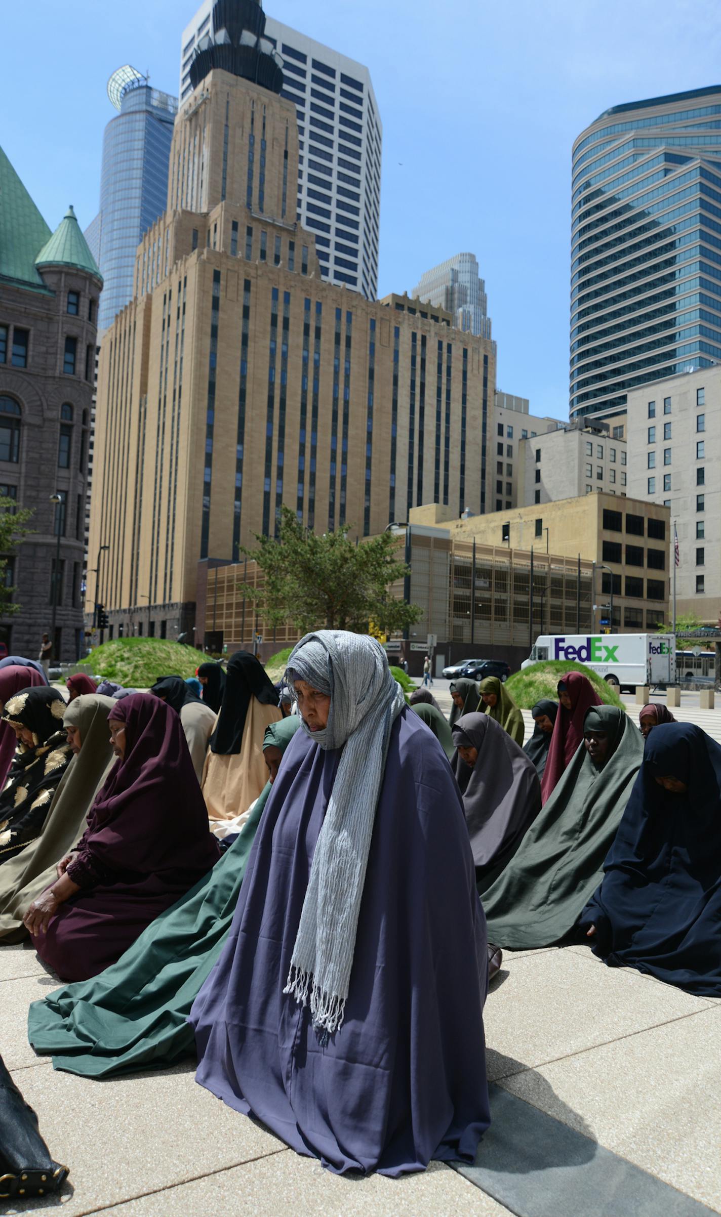 The two Rochester women convicted of raising money for Al-Shabab were sentenced Thursday May 16, 2013 in the U.S. Federal Courthouse in minneapolis family and Somali community members turned up in force to support the 2 women The community said afternoon prayers on the courthouse plaza.] Richard.Sennott@startribune.com Richard Sennott/Star Tribune. , Minneapolis Minn. Thursday 5/16/13) ** (cq)