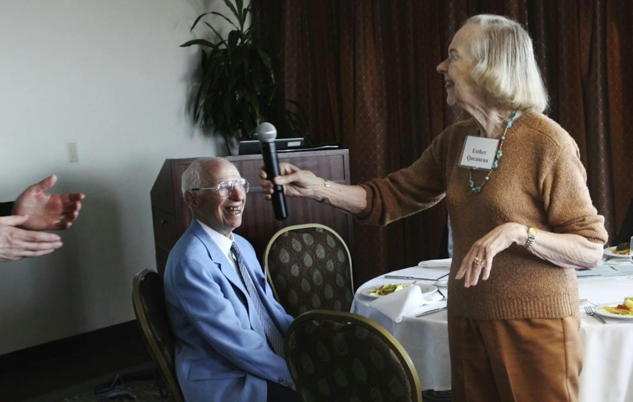Bernie Queneau smiled at his wife, Esther, during the luncheon. "He is genuinely interested in the students," said dean John Finnegan. "That kind of philanthropy is unusual."