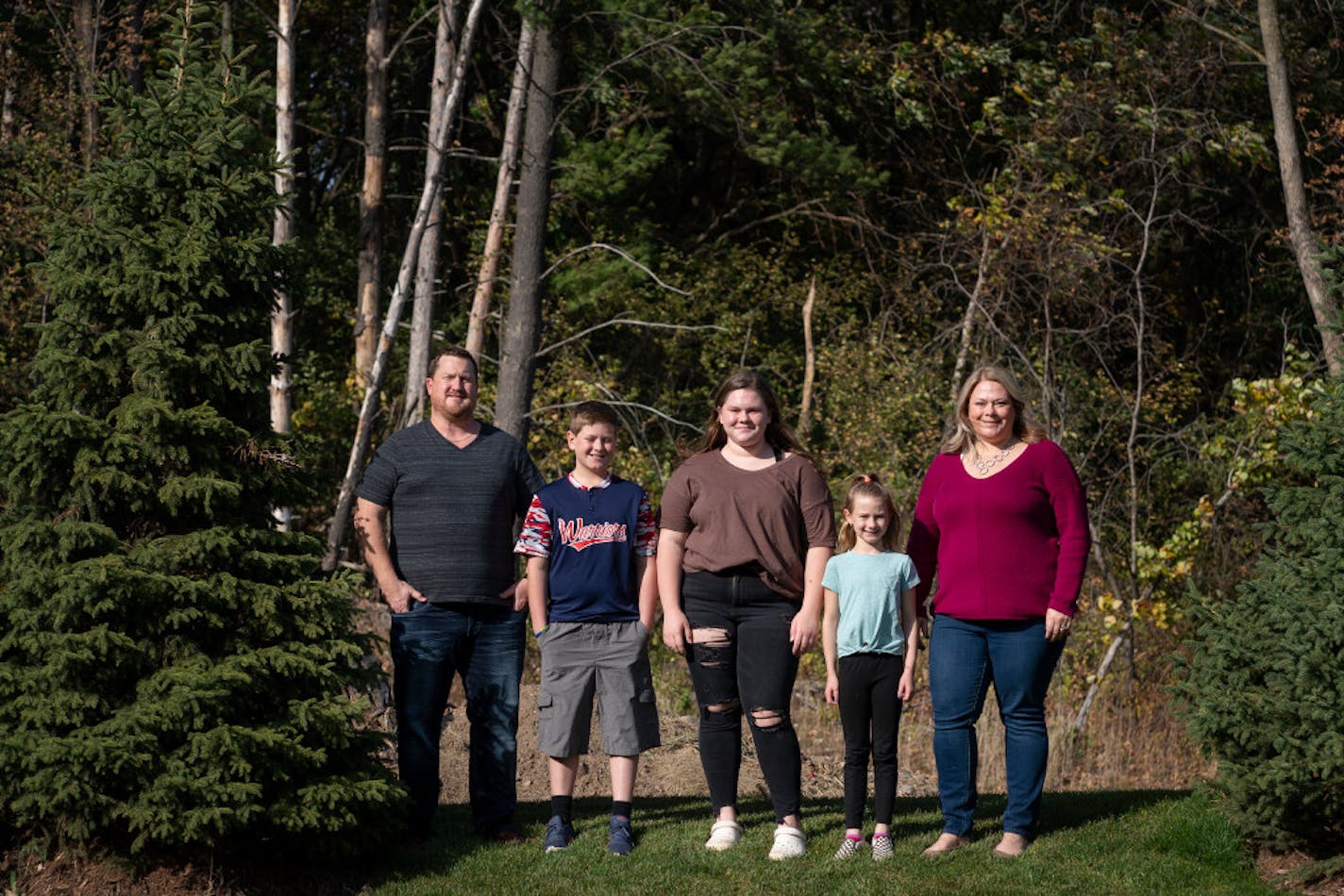 A whole family sickened: Kris, left, and Kelly Staples, right, and their children Deacon, Ava, and Leila all contracted COVID-19. Kelly Staples, who still suffers headaches, called President Donald Trump's message about the virus "completely self-serving" and "insulting."