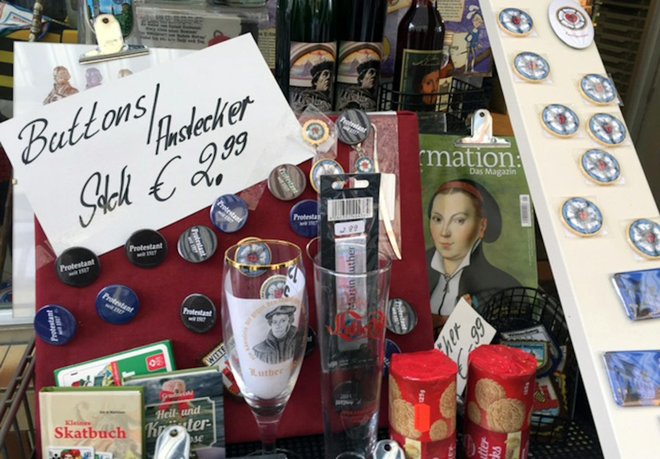 Martin Luther-themed paraphernalia, ranging from pins to cookies to refrigerator magnets, lure passing tourists in Wittenberg.