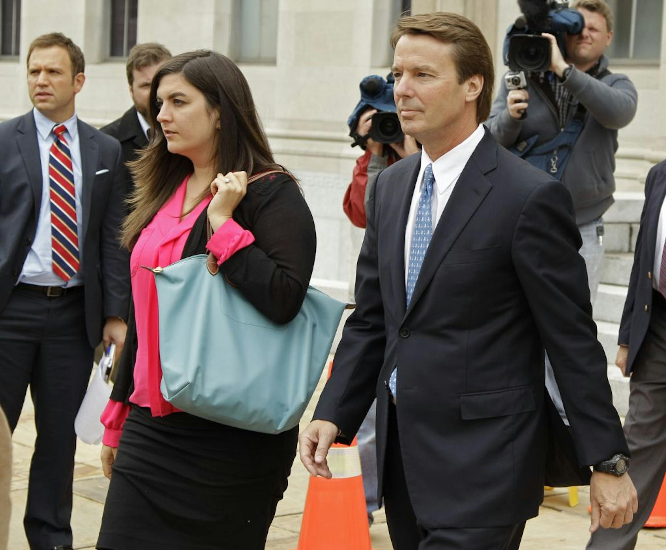 Former presidential candidate and U.S. Sen. John Edwards left the courthouse in Greensboro, N.C., on Monday with his daughter, Cate Edwards Upham.