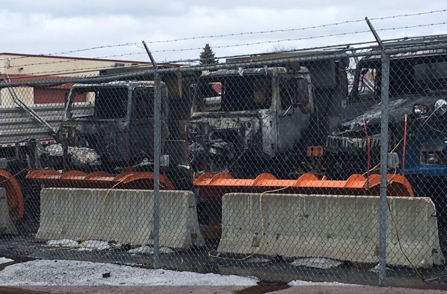 Photo by Andy Mannix: Three snowplow trucks were destroyed by fire early Saturday in Minneapolis.