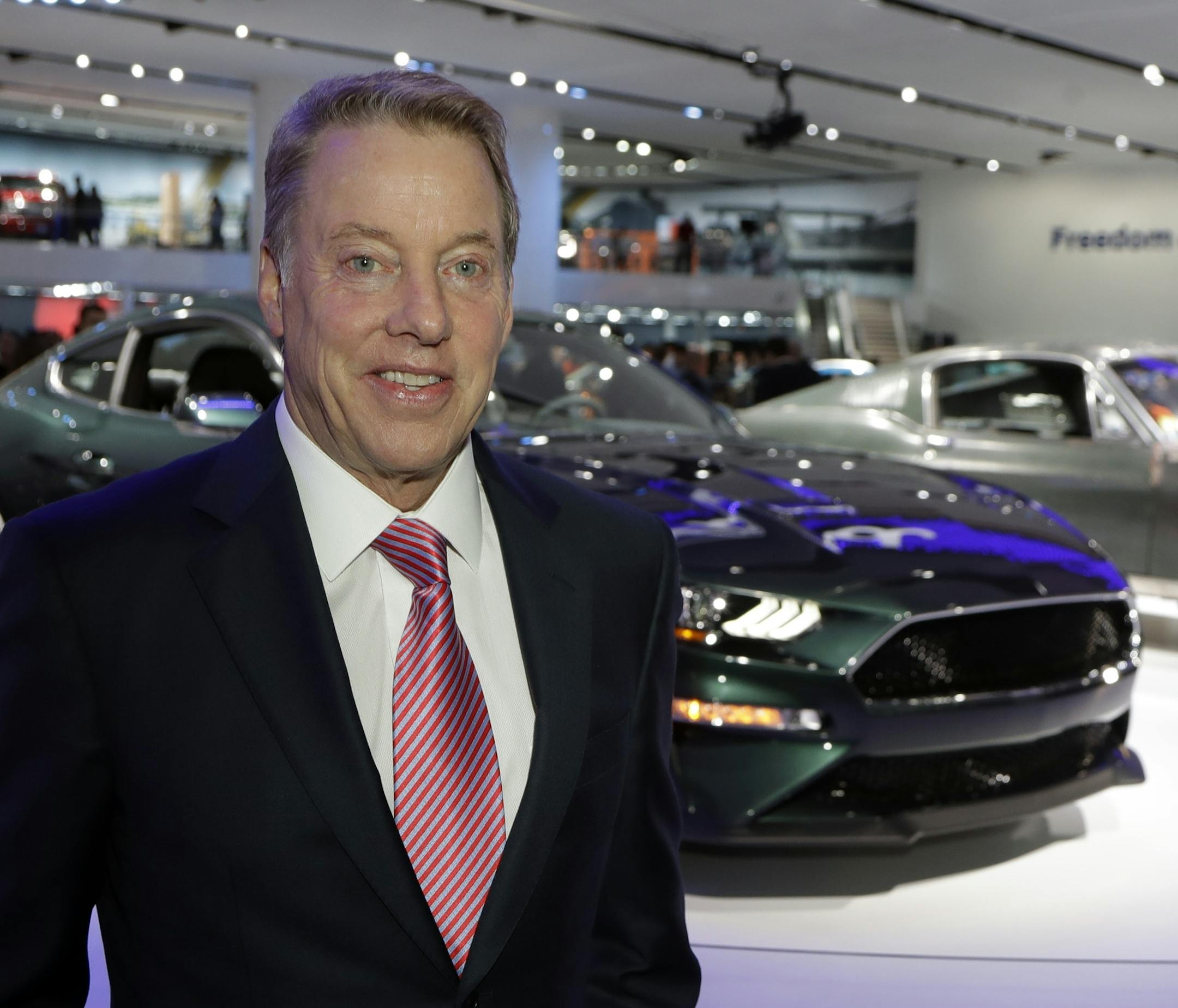 Ford Motor Co., Executive Chairman Bill Ford, stands next to the 2019 Bullitt Mustang and the original Bullitt, right, on the floor at the North American International Auto Show, Monday, Jan. 15, 2018, in Detroit. (AP Photo/Carlos Osorio)