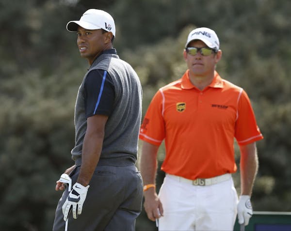 Tiger Woods of the United States, left, and Lee Westwood of England.