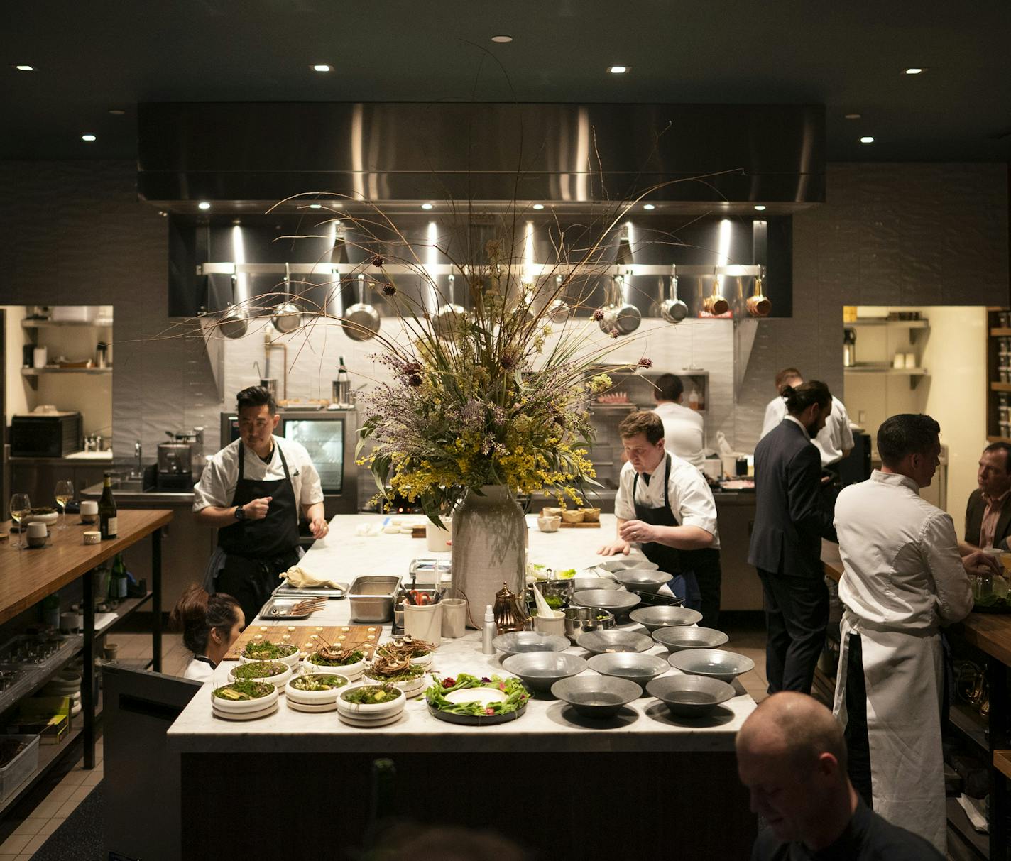 The open kitchen of Demi during service Wednesday night. ] JEFF WHEELER &#x2022; jeff.wheeler@startribune.com Gavin Kaysen's new restaurant, Demi, has opened in the North Loop. The remarkable, standard-setting restaurant was photographed during dinner service Wednesday evening, May 8, 2019 in Minneapolis.