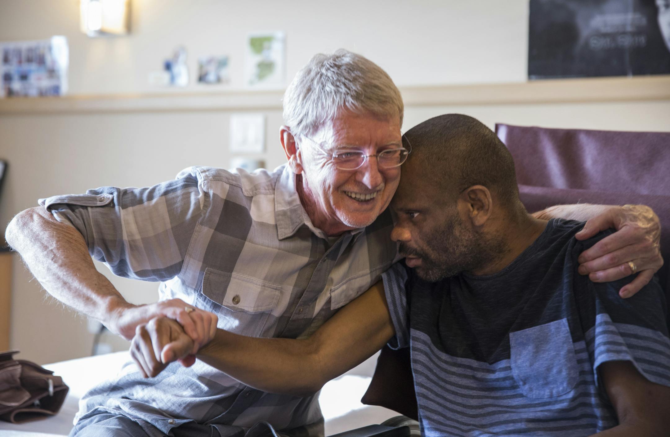 Care Providers of Minnesota volunteer of the year Dick Schirmacher with &#x201c;DQ buddy&#x201d; Tony Hightower at Good Samaritan Society in Robbinsdale.