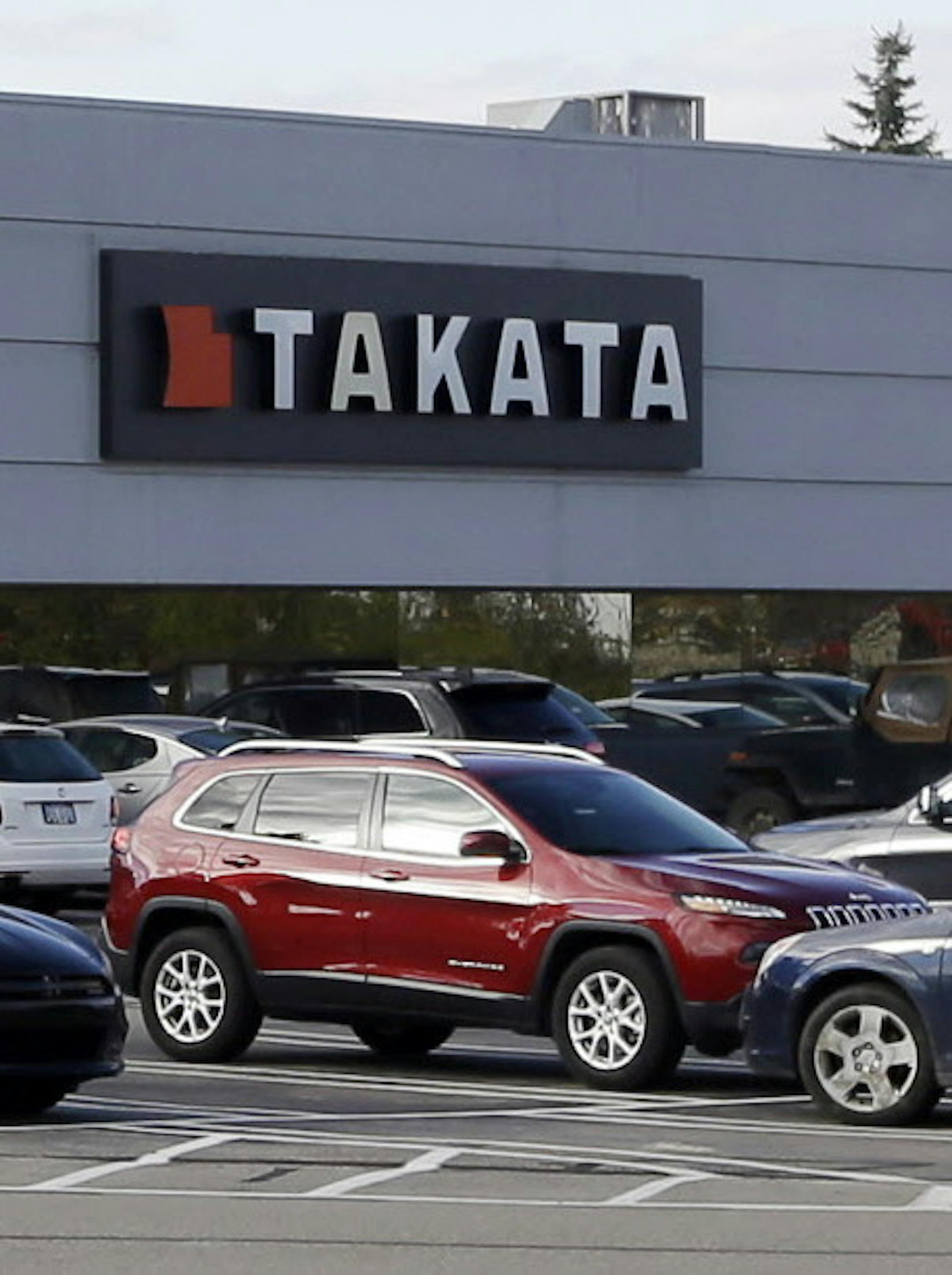 FILE - This Oct. 22, 2014, file photo, shows the Takata building in Auburn Hills, Mich. Scientists hired by the auto industry have determined that multiple factors, including moisture and high humidity, can cause some Takata air bags to inflate with too much force and hurl shrapnel at drivers and passengers. The Independent Testing Coalition, which has been investigating the cause for the past year, announced its findings Tuesday, Feb. 23, 2016. (AP Photo/Carlos Osorio, File)