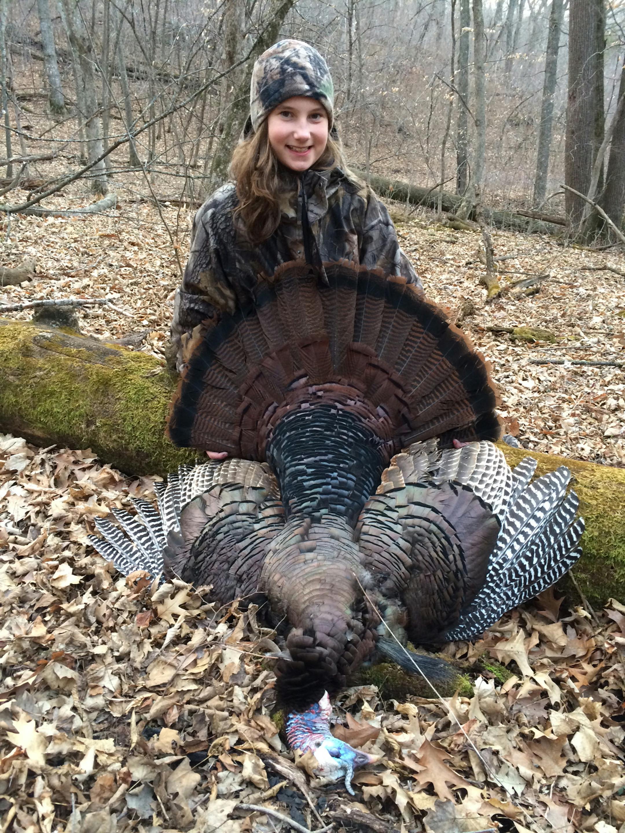 Tilly Nugent, 11, Minnetonka, with a gobbler she bagged in Minnesota this spring.