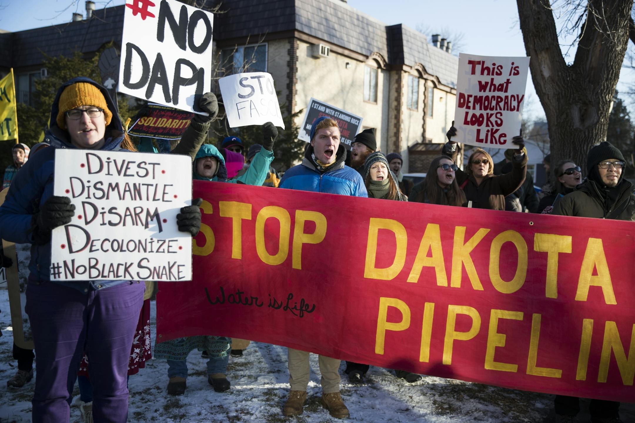 A group of people (at it's highest point 500 people) chanted protests to the Dakota Access Pipeline before marching onto the Marshall Avenue Bridge (Lake Street) in Minneapolis, Minn., on Friday, January 27, 2016.