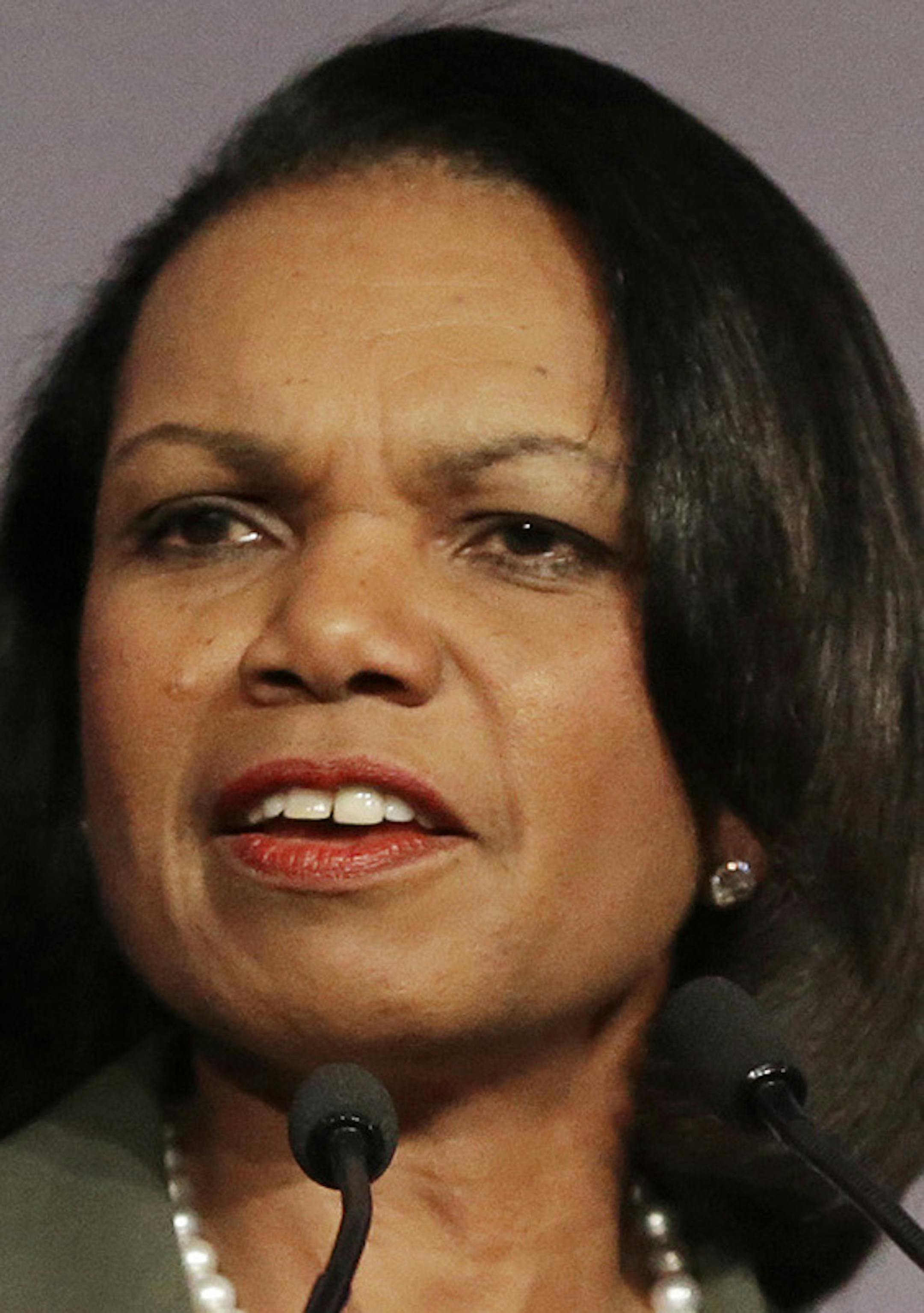 FILE - In this March 15, 2014 file photo, former Secretary of State Condoleezza Rice gestures while speaking at the California Republican Party 2014 Spring Convention in Burlingame, Calif. University of Minnesota faculty and student activists are pressuring the school to rescind its invitation to Rice to speak at the Twin Cities campus April 17 as part of the Humphrey School of Public Affairs‚Äô lecture series. Math professor William Messing has introduced a resolution to be con