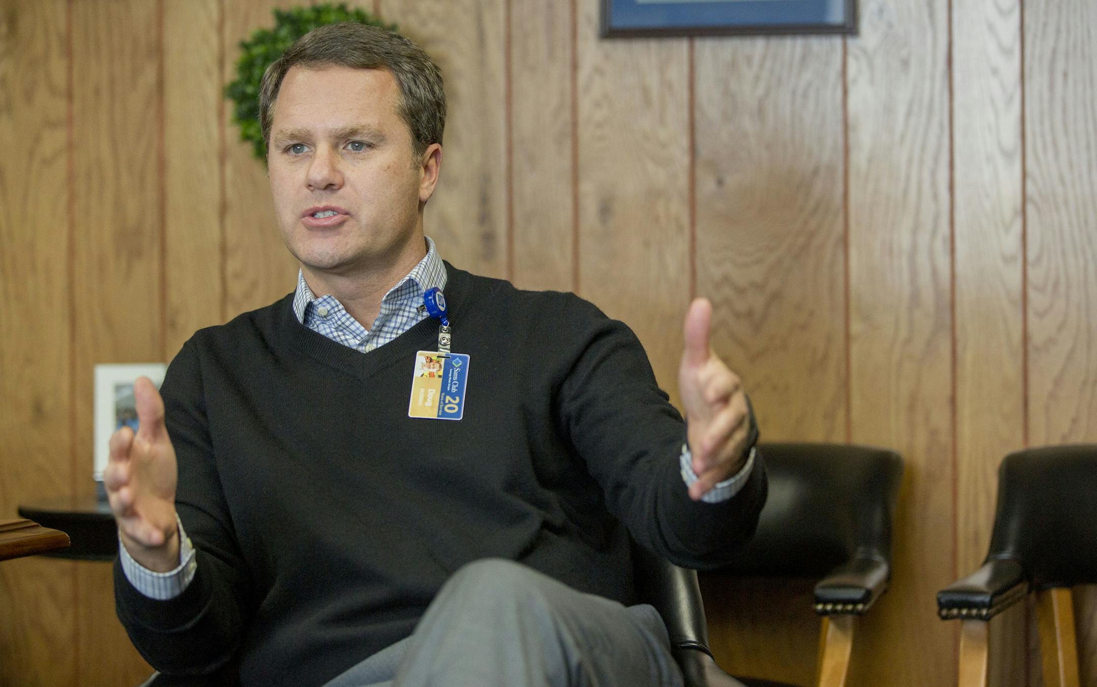 Wal-Mart President and Chief Executive Officer Doug McMillon speaks during an interview with The Associated Press on Tuesday, Feb. 17, 2015, in Bentonville, Ark. Wal-Mart Stores Inc. is spending $1 billion to change how it pays and trains hourly staff in a move it hopes will help reshape the image that it only offers dead-end jobs. (AP Photo/Gareth Patterson)