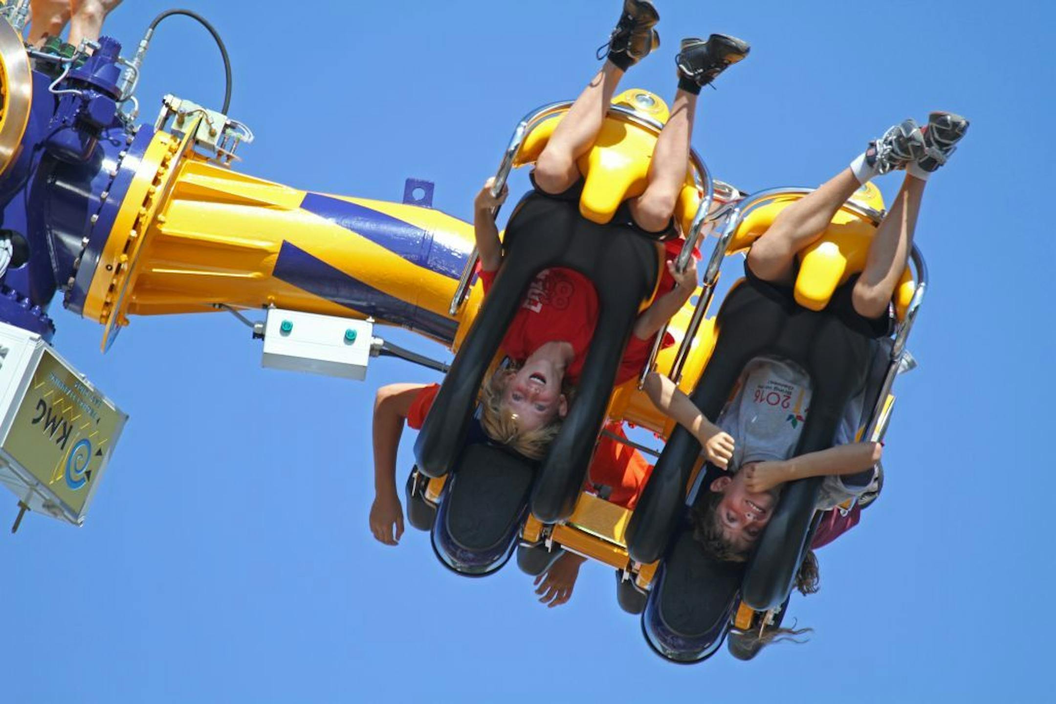 2010 Minnesota State Fair. Daring riders were flipped upside down on the Rock It ride at the midway.