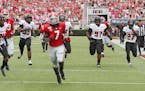 FILE - In this Saturday, Sept. 14, 2019, file photo, Georgia running back D'Andre Swift (7) scores on a pass play which he broke for a touchdown durin