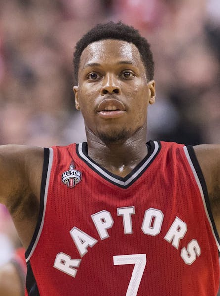 Toronto Raptors guard Kyle Lowry (7) reacts after sinking a third point shot during the second half of an NBA basketball game against the Minnesota Ti