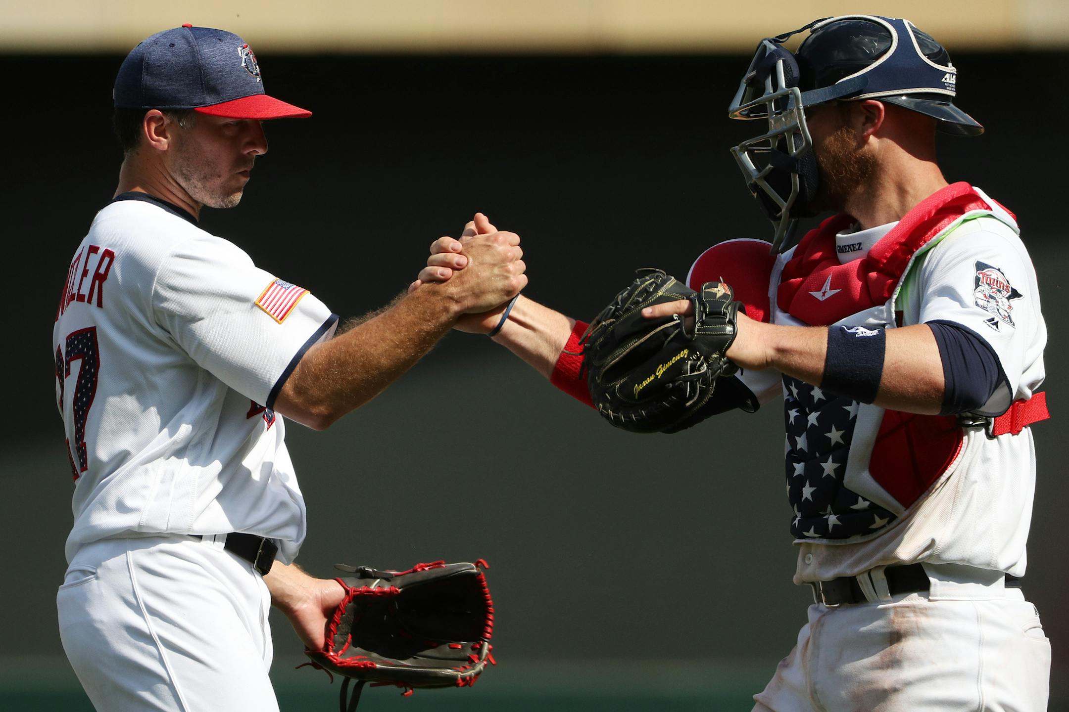 Twins closer Brandon Kintzler celebrated Tuesday’s 5-4 victory over the Angels with catcher Chris Gimenez.