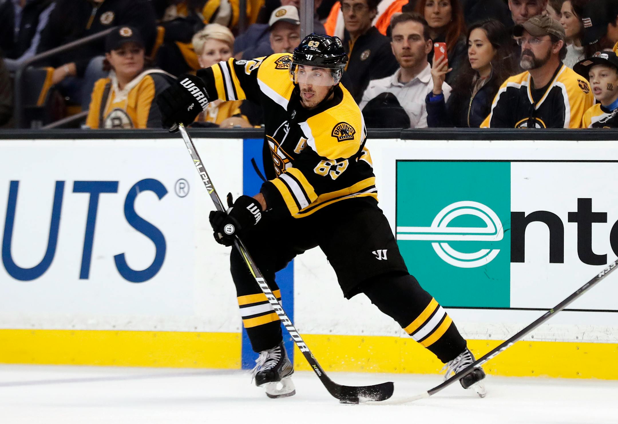 The Bruins' Brad Marchand looked to pass the puck against the Vegas Golden Knights during the second period in Boston on Thursday.