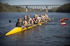 Members of the University of Minnesota women's rowing team practiced on the Mississippi River on Wednesday afternoon.