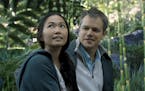 In this image released by Paramount Pictures, Hong Chau, left, and Matt Damon appear in a scene from "Downsizing." (Paramount Pictures via AP)