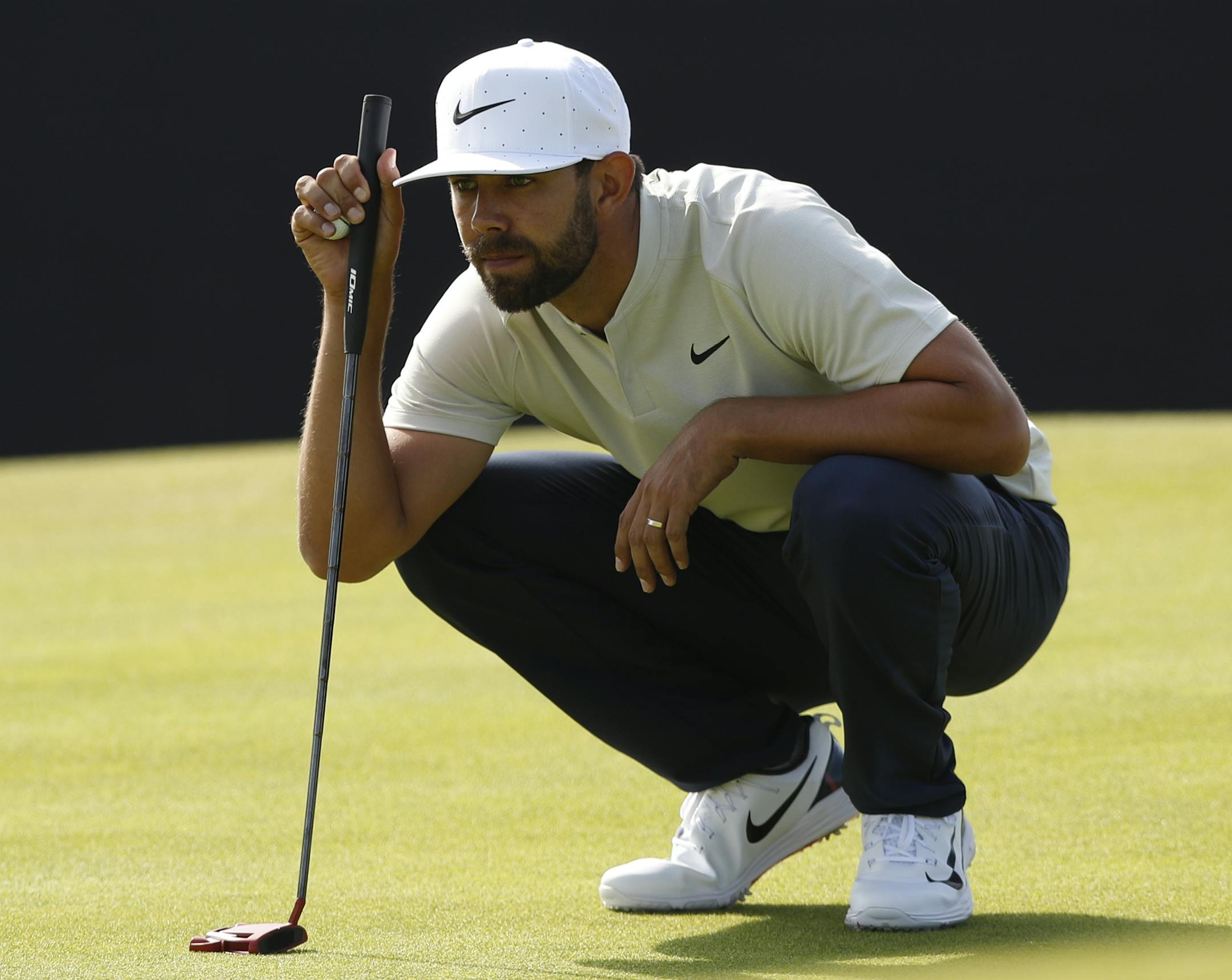 Erik Van Rooyen lined up a putt on the 13th green during the first round of the British Open