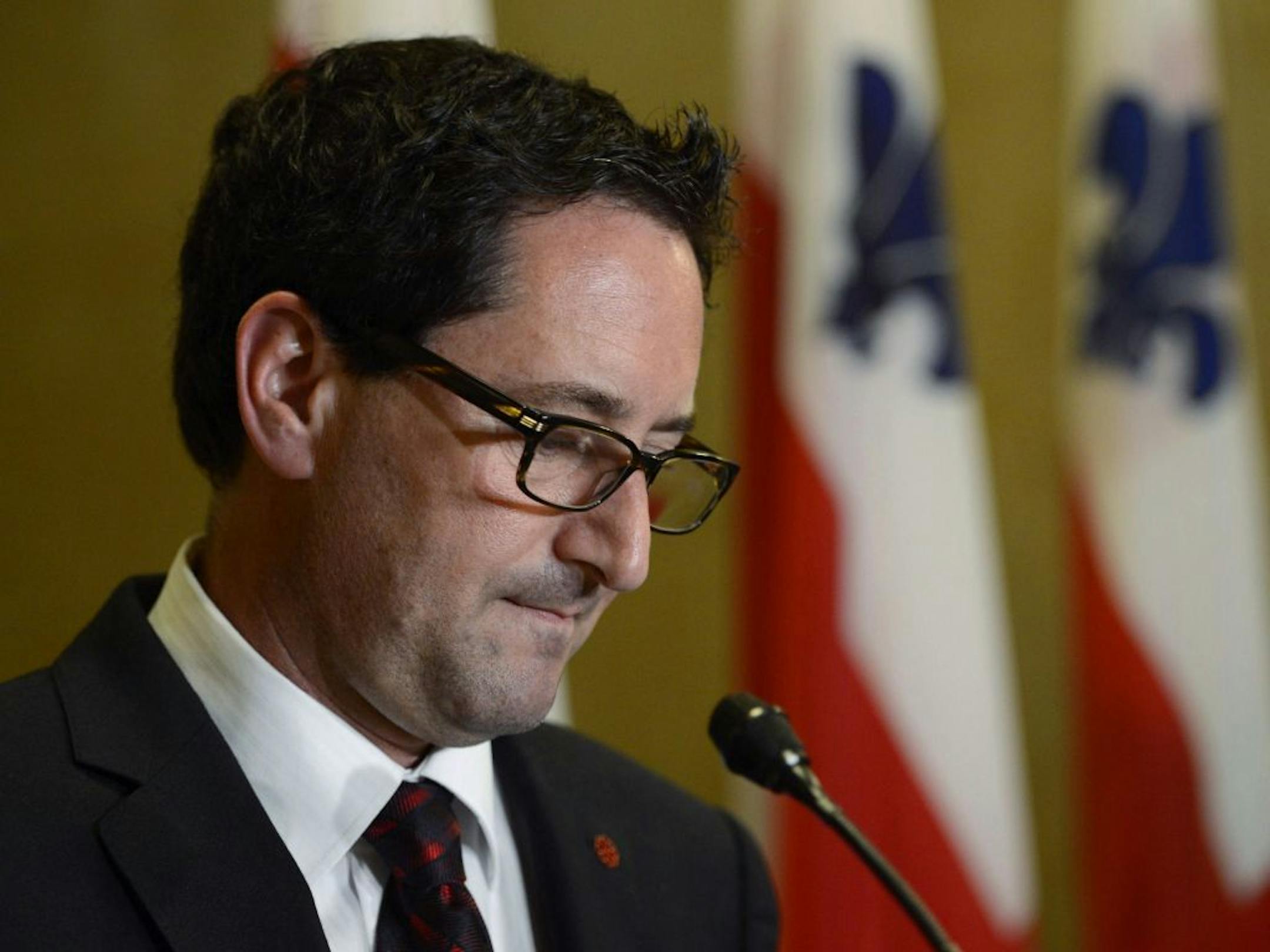 Montreal Mayor Michael Applebaum announces his resignation a day after his arrest on fraud charges, Tuesday, June 18, 2013, at a news conference in Montreal. Applebaum had vowed to clean up the corruption scandals rocking the city. He faces 14 charges, including defrauding the government and corruption in municipal affairs.
