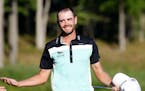 Troy Merritt celebrated winning the Quicken Loans National golf tournament at the Robert Trent Jones Golf Club in Gainesville, Va., on Sunday. Merritt