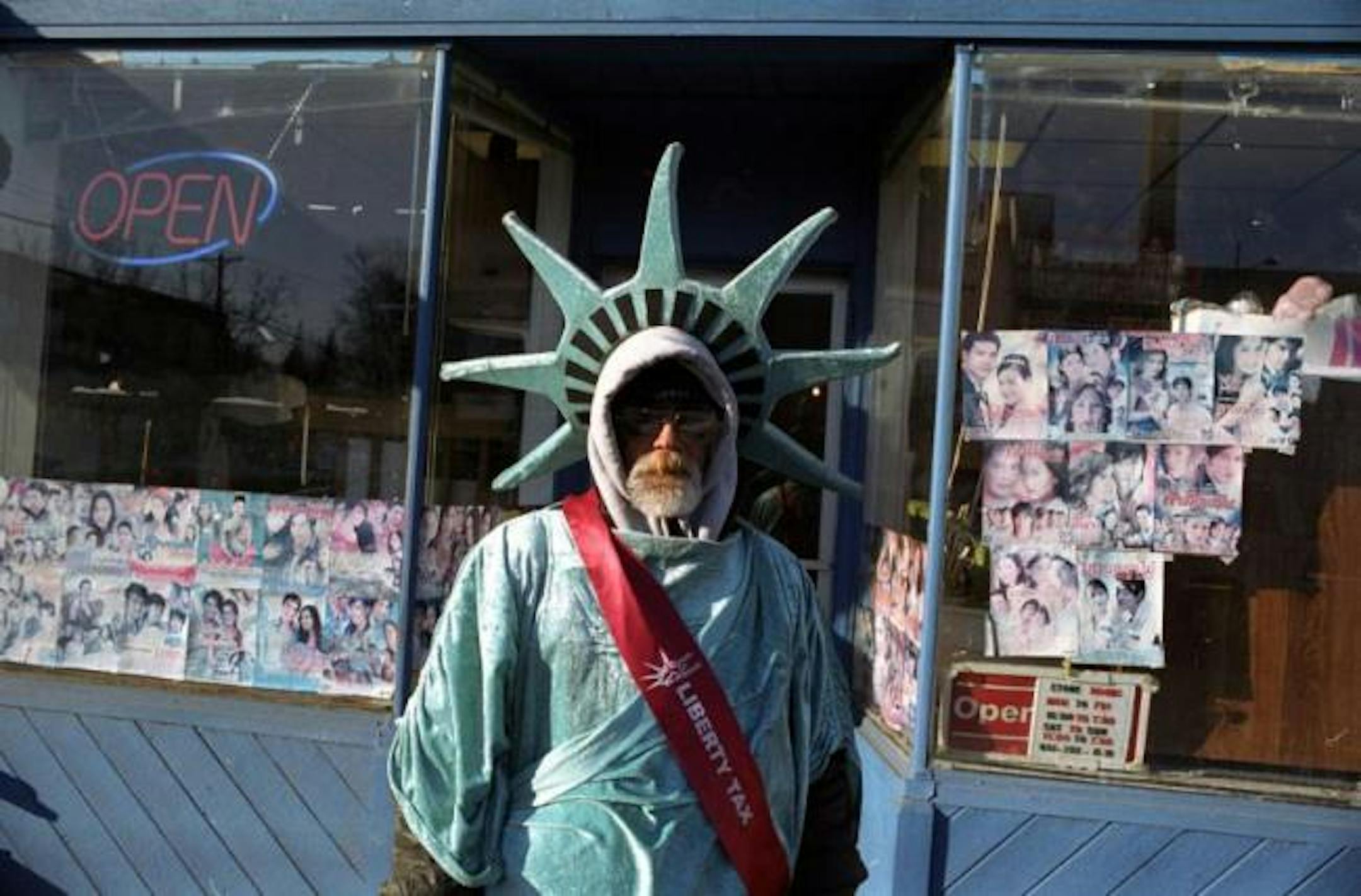 "The Waver," Liberty Tax employee, University Avenue, 2008.
