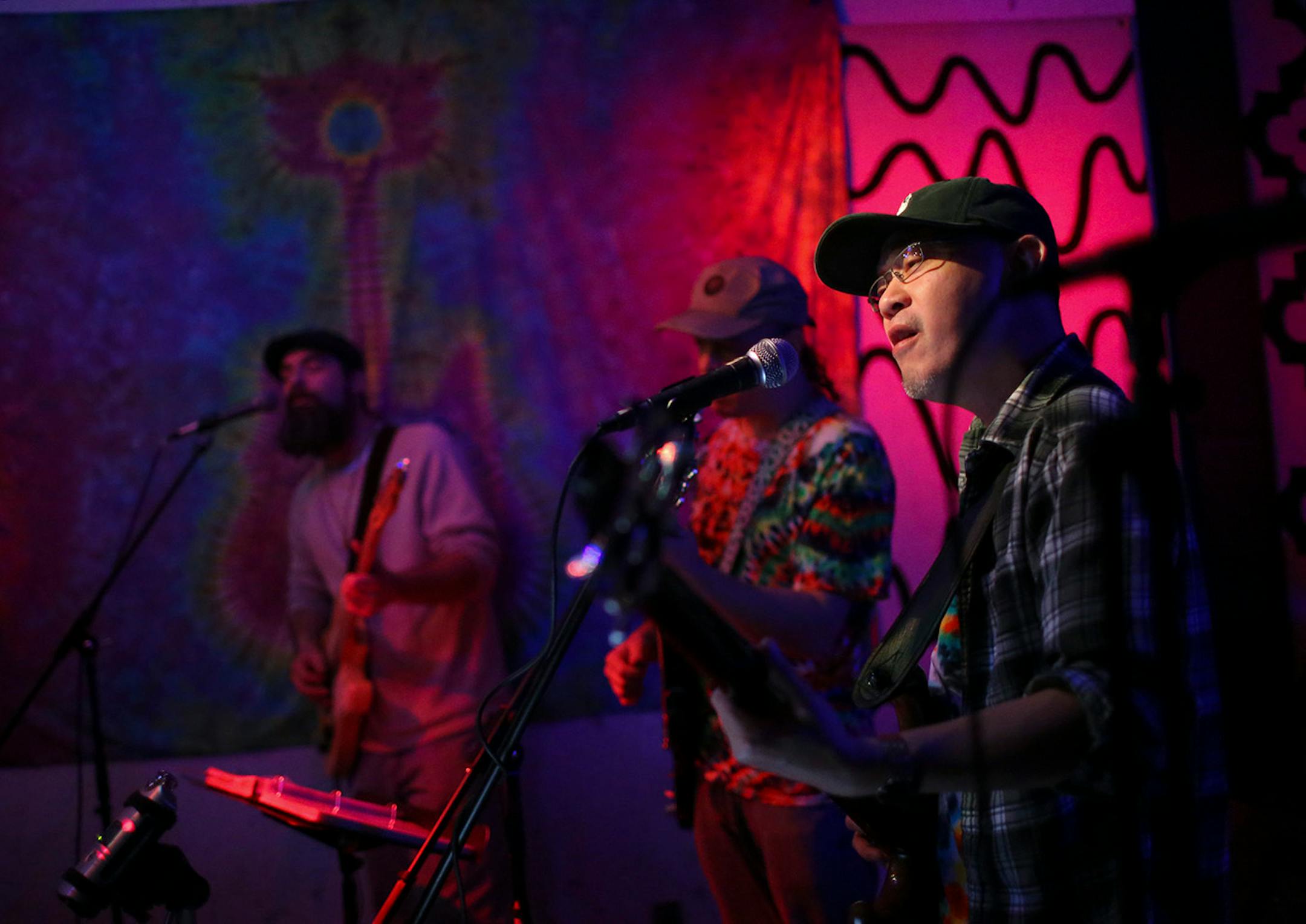 Bassist Phil Wong with guitarists James Super and Michael Corcoran, front to back, of the Shotgun Ragtime Band at the Driftwood Char Bar in Minneapolis. ] JEFF WHEELER • jeff.wheeler@startribune.com For nearly 200 consecutive Sundays, the Shotgun Ragtime Band has hosted a Grateful Dead tribute night at the Driftwood Char Bar in Minneapolis. The Shotgun Ragtime Band kept their streak alive Sunday night, January 25, 2015 at the Driftwood Char Bar in Minneapolis.
