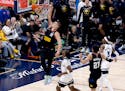 Nikola Jokic of the Nuggets dunks during the fourth quarter against the Timberwolves in Game 5 of the Western Conference semifinals at Ball Arena in D