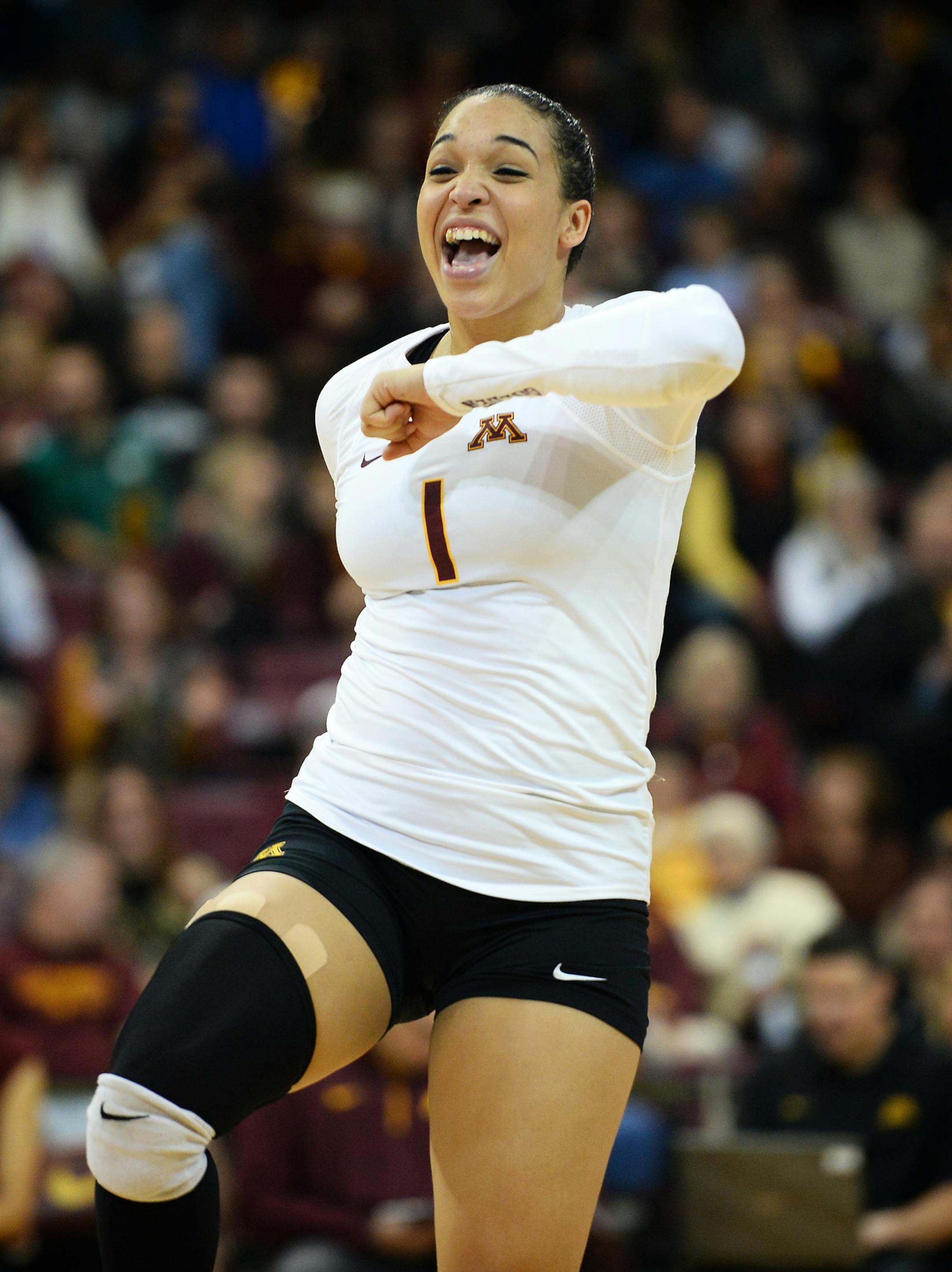 Minnesota outside hitter Daly Santana (1) celebrated after scoring a point against Indiana in the third set Wednesday. Minnesota beat Indiana 3-0. ] (AARON LAVINSKY/STAR TRIBUNE) aaron.lavinsky@startribune.com The University of Minnesota Gophers volleyball team (No. 4) played the Indiana Hoosiers on Wednesday, Oct. 28, 2015 at the University of Minnesota Sports Pavilion.