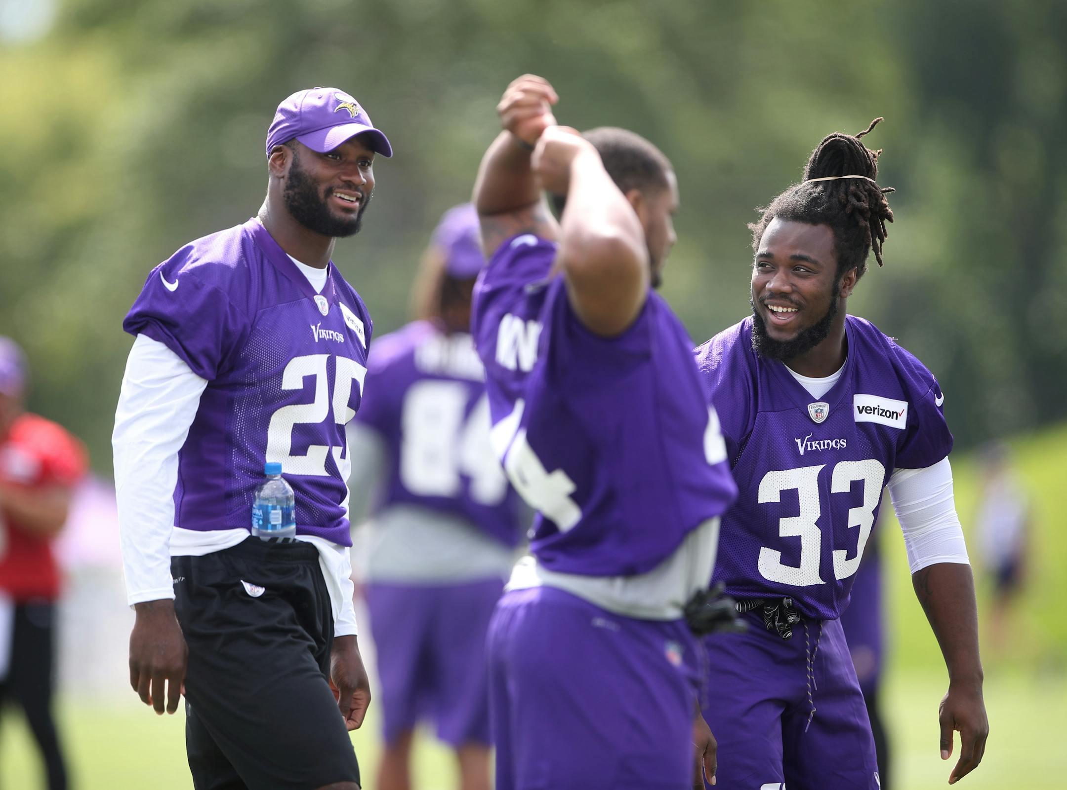 Vikings running backs Latavius Murray left Terreli Newby , and Dalvin Clark chatted before practice at Minnesota State University Mankato Monday July 24, 2017 in Mankato , MN.