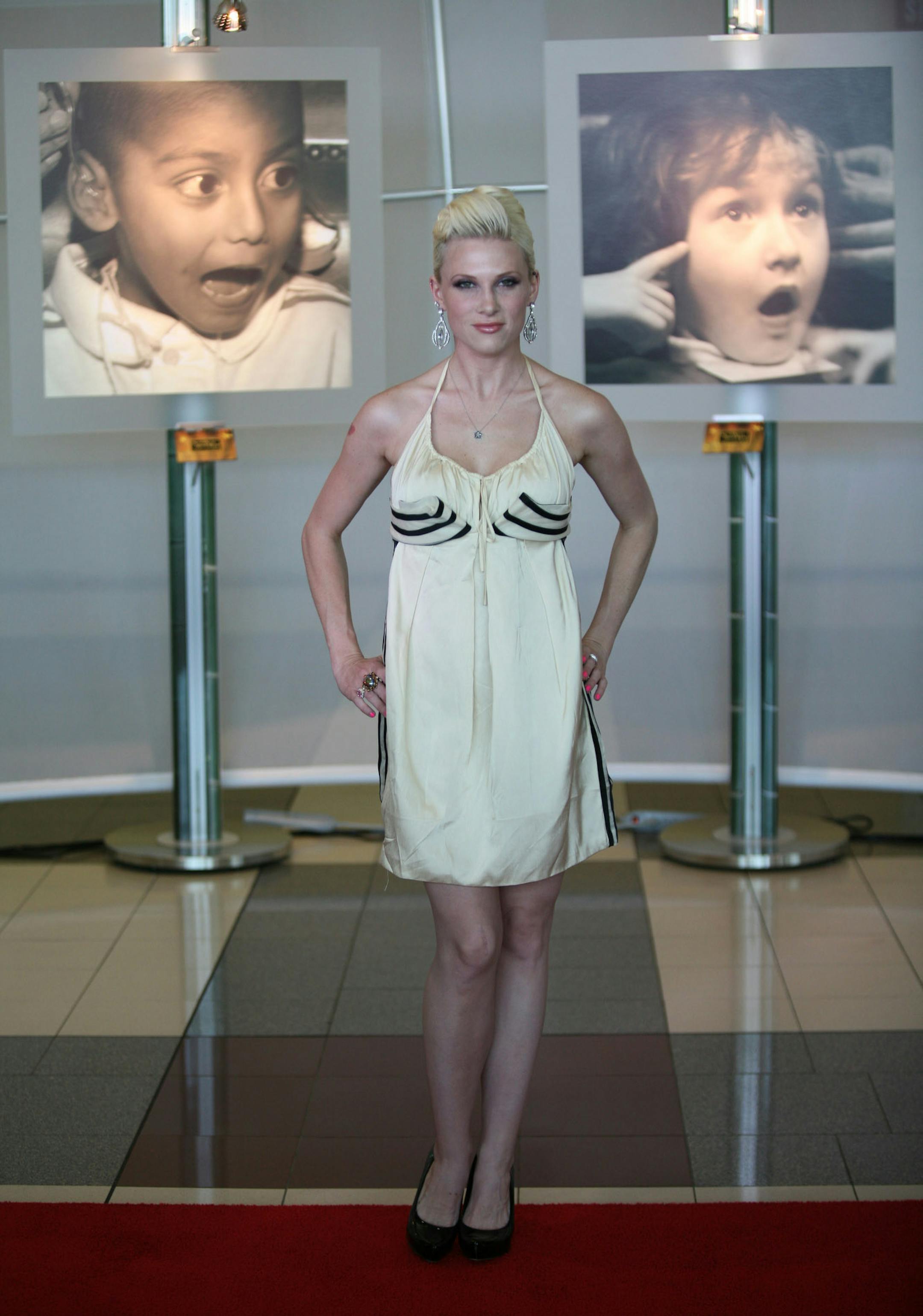 Lucy Walsh, Joe Walsh's daughter, of MTV's "Rock the Cradle" Wearing: Jean Paul Gaultier dress, Aldo shoes and $20 earrings. "I never like to spend money on things. It's all about taking one designer piece and then doing it up with Forever 21 jewelry. That's how I roll. You can't tell the difference. That's the best part." Q Do you own any Garth Brooks' CDs? A I do. My mother is in love with Garth Brooks. I think everyone's mother is. I'm pumped. "The Dance" is probably my favorite song ever.