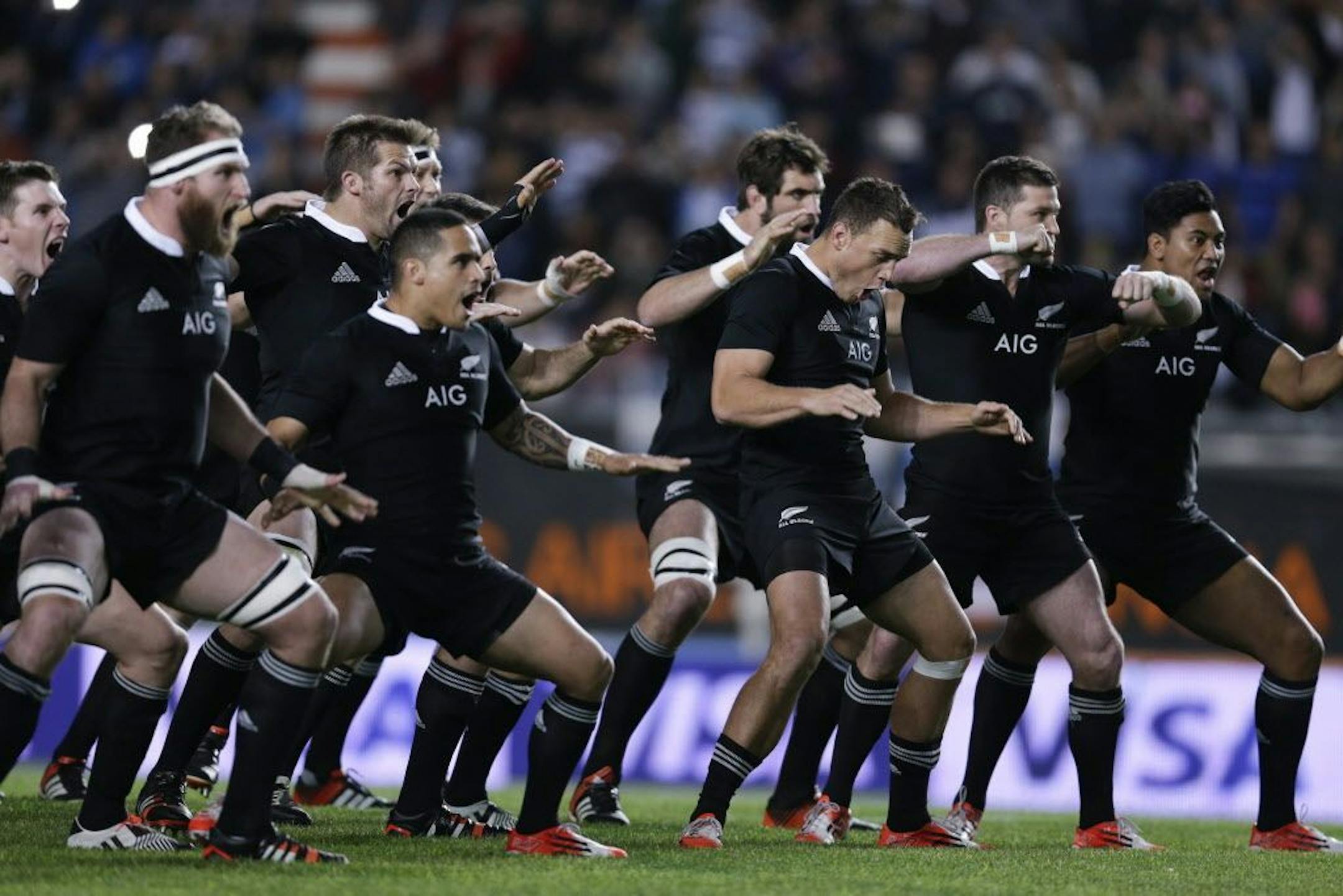 New Zealand's All Blacks perform a traditinal haka dance before their Rugby Championship match against Argentina in La Plata, Argentina, Saturday, Sept. 27, 2014.