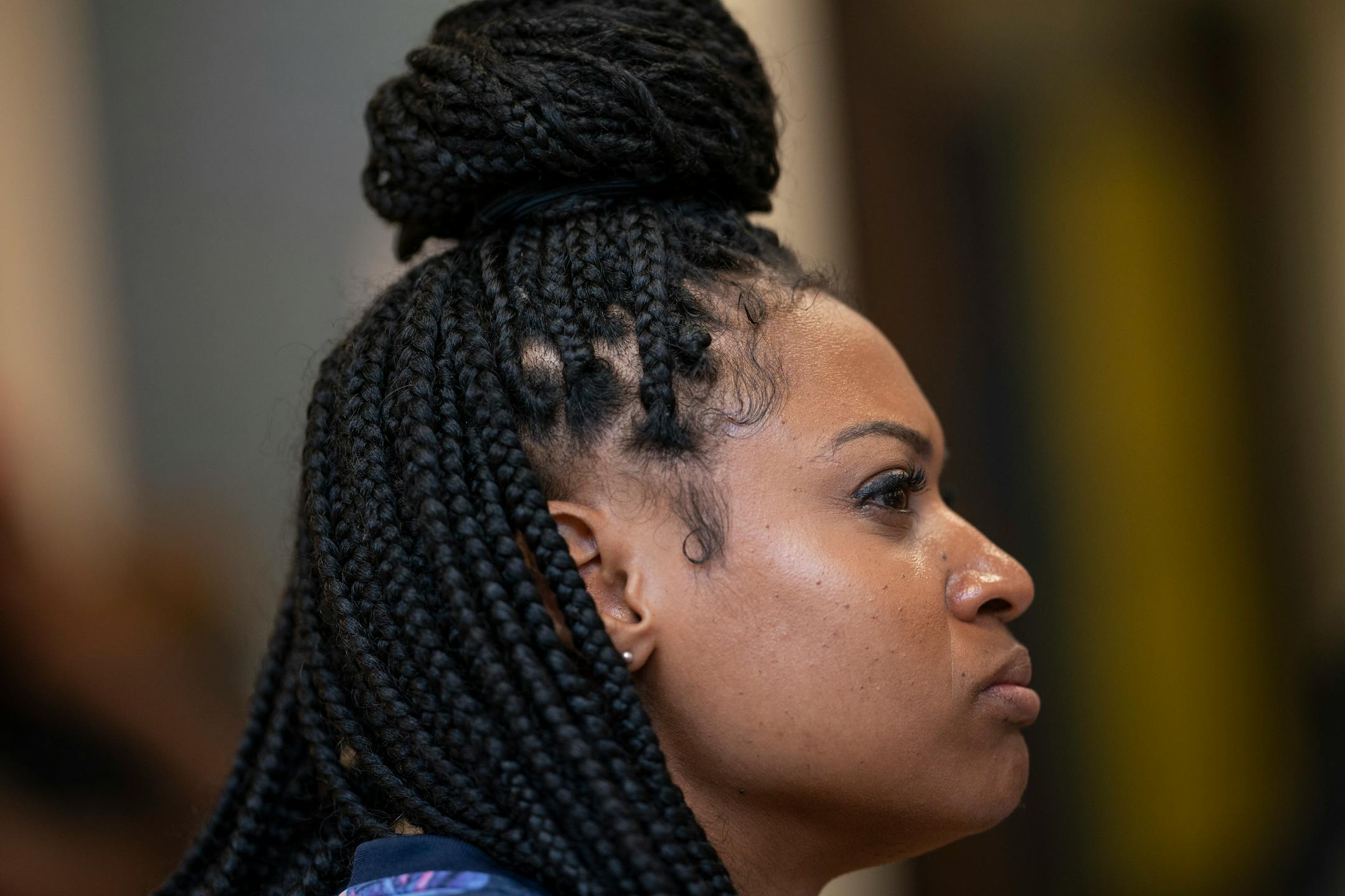 English teacher Nafeesah Muhammad listened too Black Storytellers Vusumuzi Zulu and his wife Nothando Zulu as they spoke to a morning English class at Edison High School.