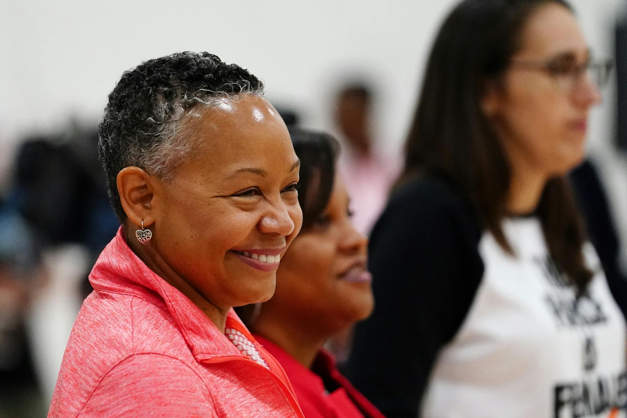 WNBA league president Lisa Michelle Borders watched from the sidelines at the start of the clinic.