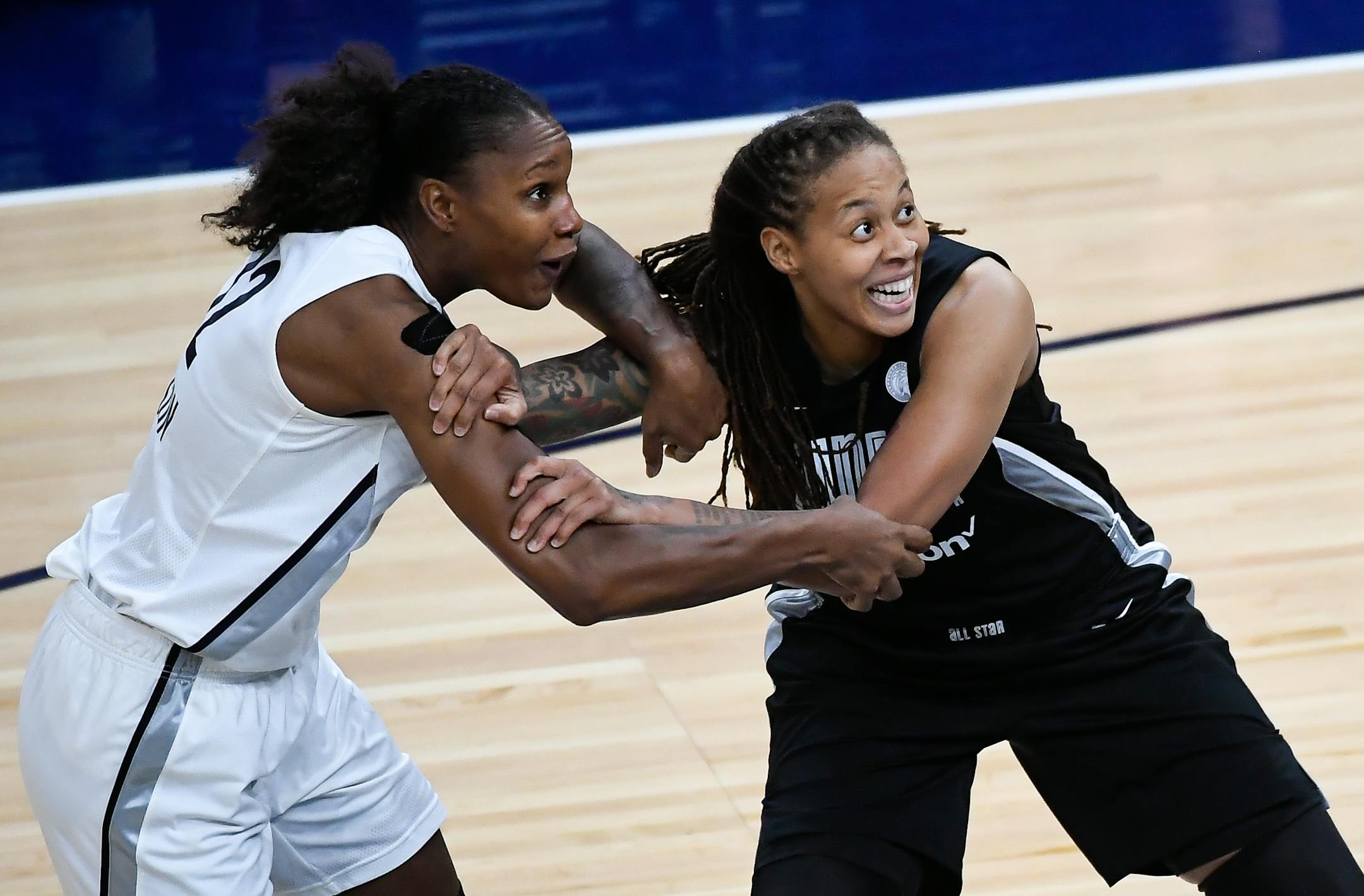Team Parker forward Rebekkah Brunson, left, was guarded by Team Delle Donne guard Seimone Augustus in the second half of the WNBA All-Star Game Saturday.