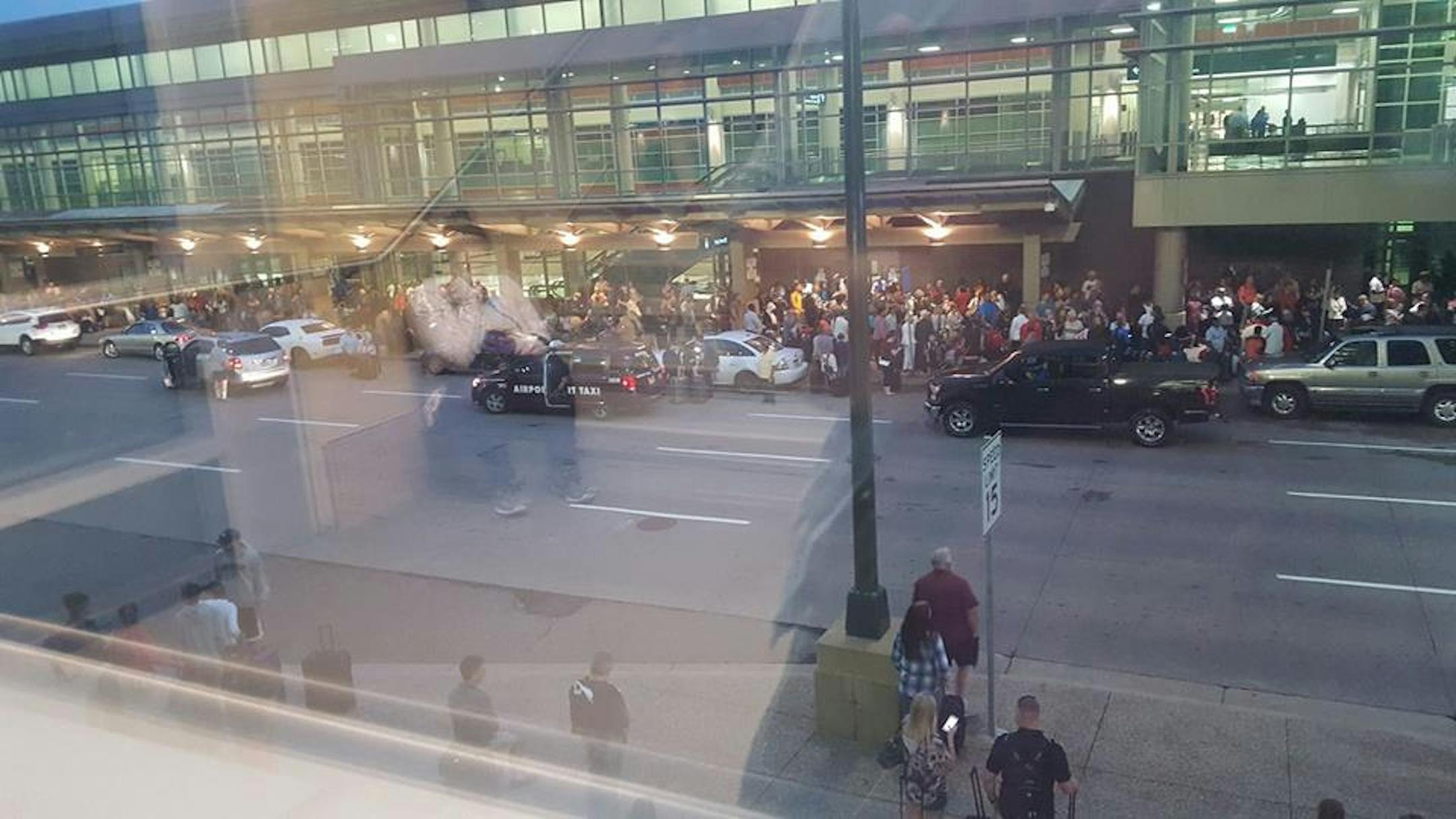 This image was taken by passenger Marcy Woodard as she waited in the parking garage at MSP's Terminal 2, which was evacuated while a suspicious package was investigated early Wednesday.