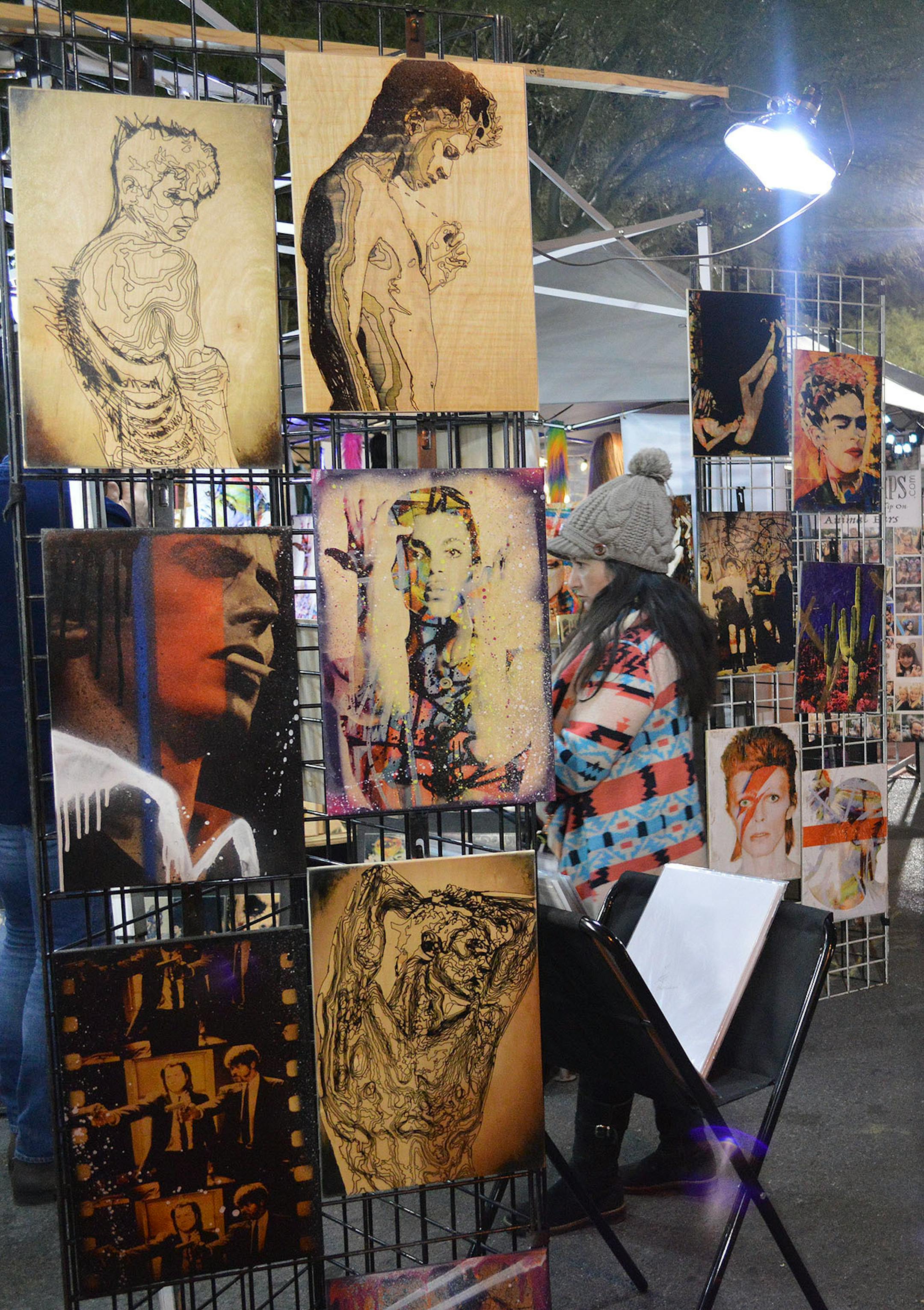 Vendors sell everything from paintings to T-shirts to marijuana pipes at Las Vegas' monthly First Friday festival in the Arts District.