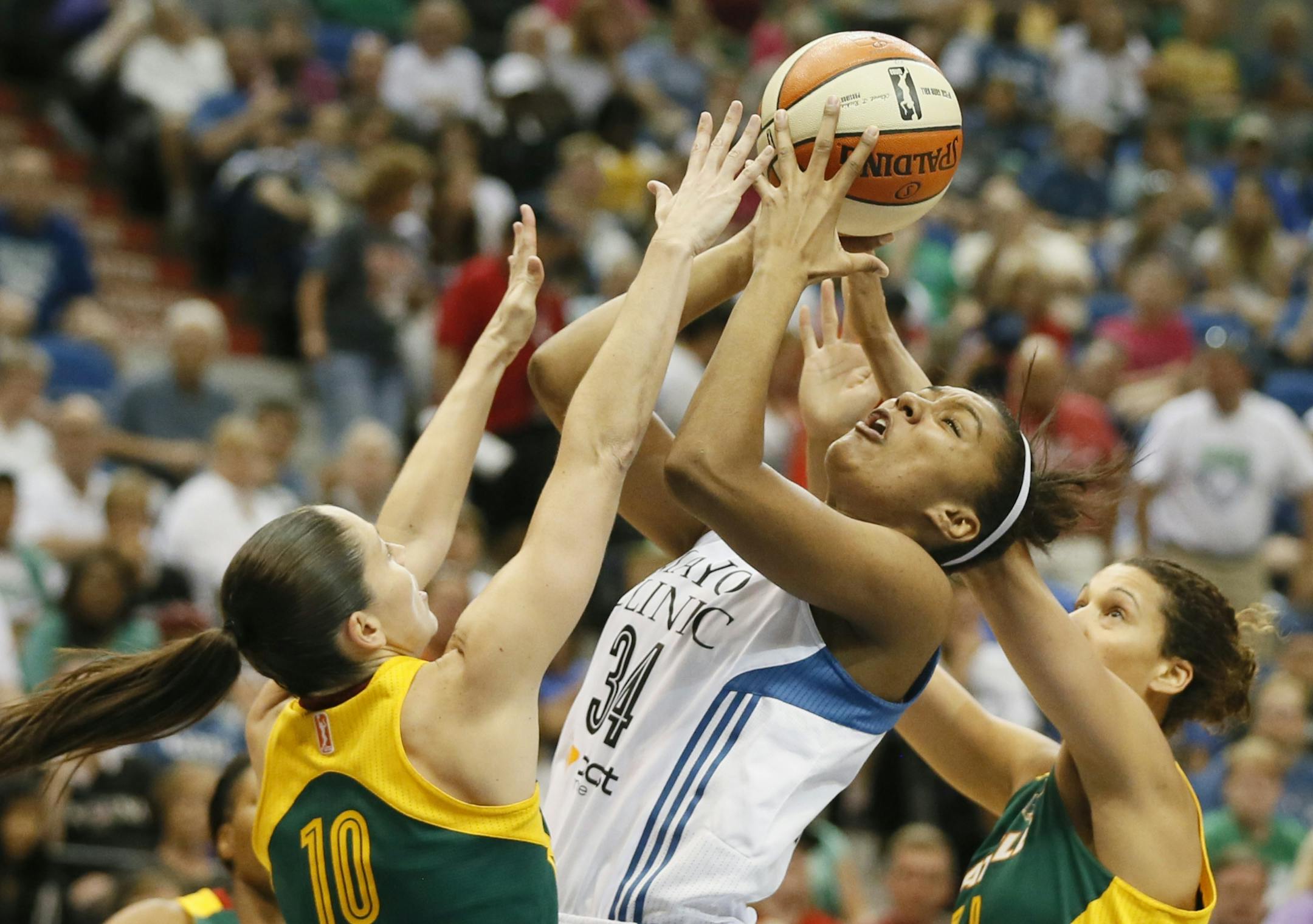 Minnesota Lynx forward Damiris Dantas (34) was fouled by Seattle Storm guard Sue Bird (10) when Dantas was a rookie with the Lynx in 2014.