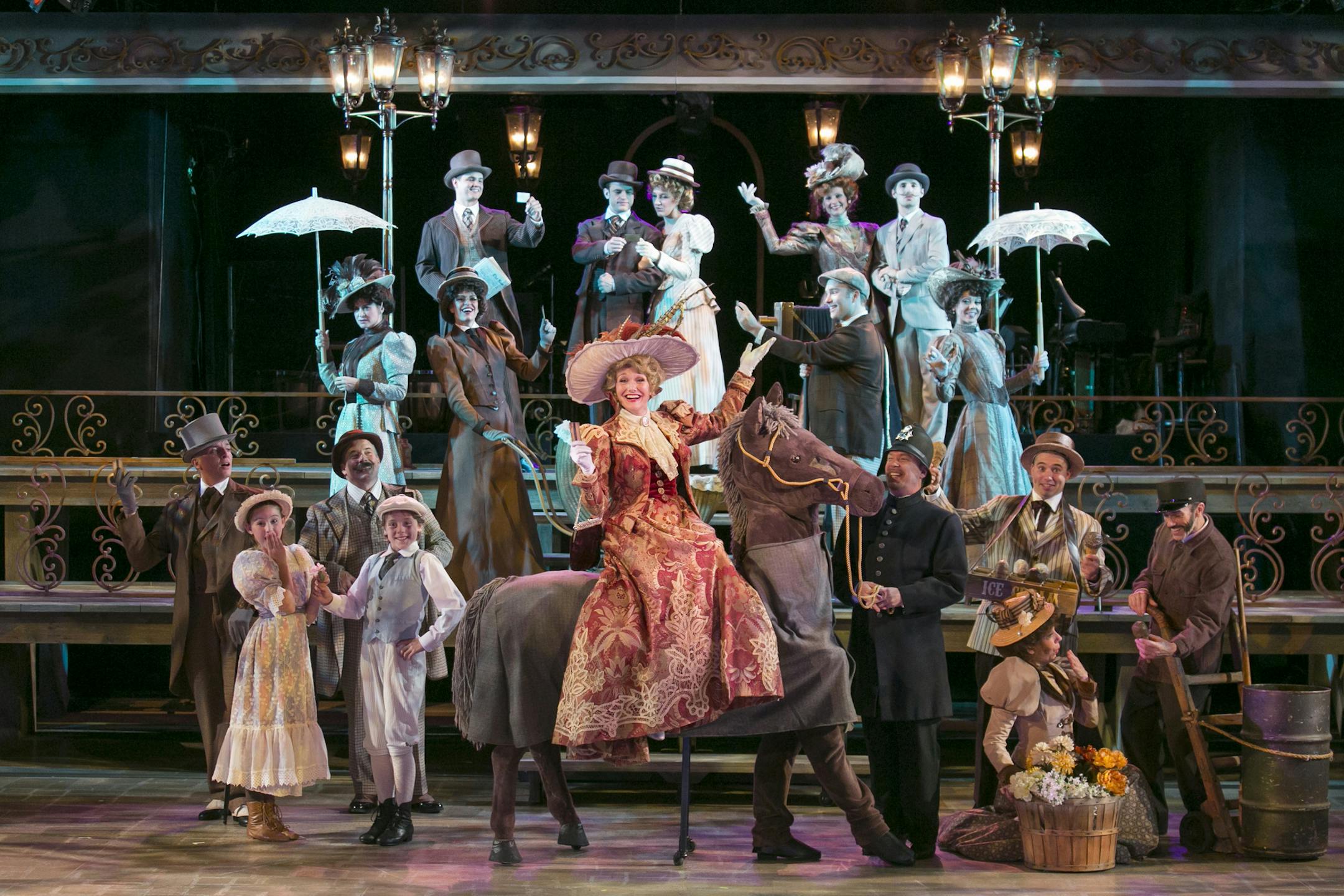 Michelle Barber as Dolly (& company) Chanhassen Dinner Theater production of Hello, Dolly! Photo Credit: Heidi Bohnenkamp 2014