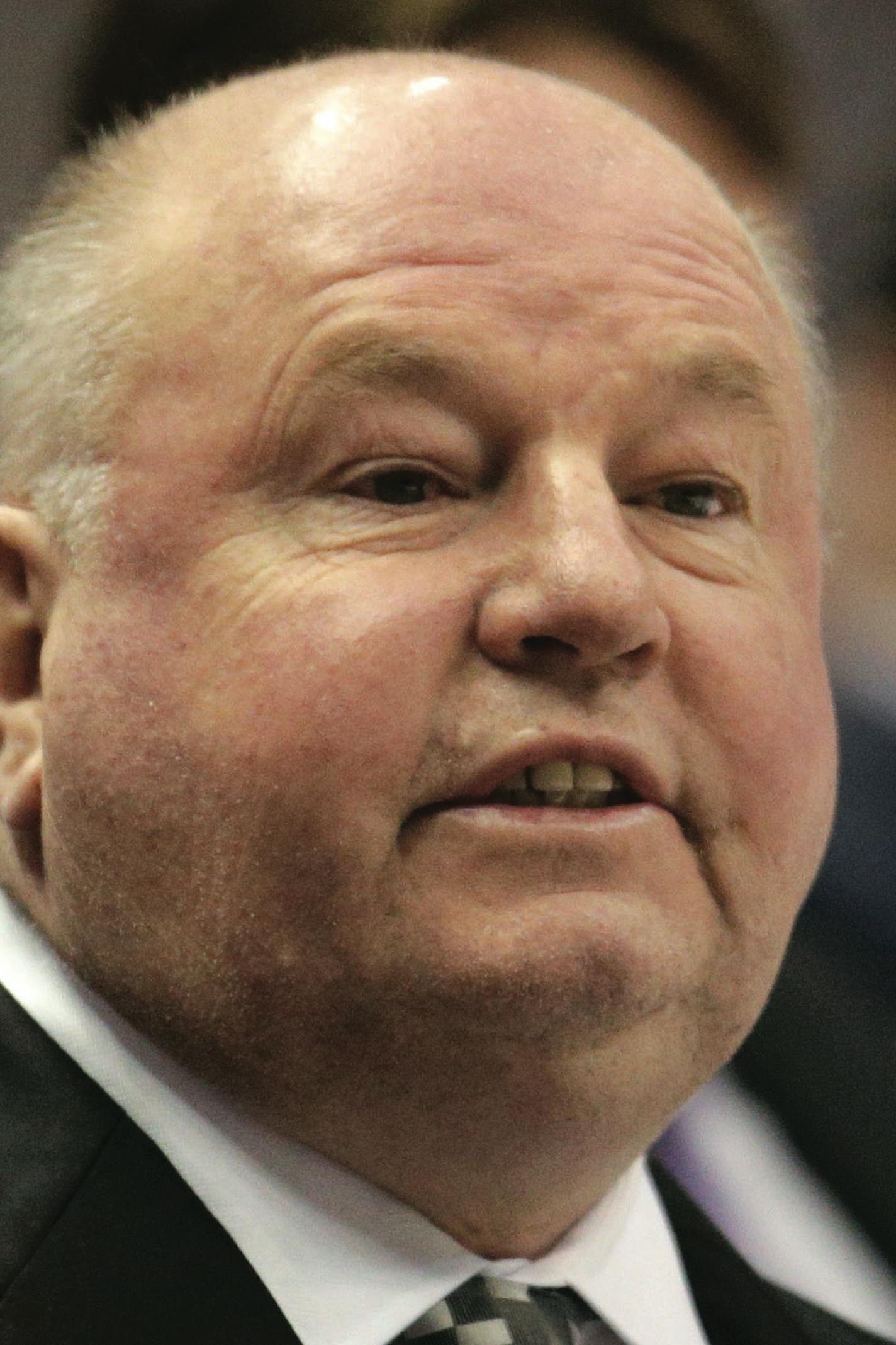 FILE - In this April 8, 2015 file photo, Anaheim Ducks head coach Bruce Boudreau coaches his team during the first period of an NHL hockey game against the Dallas Stars, in Anaheim, Calif. The Anaheim Ducks have fired coach Bruce Boudreau after their first-round exit from the playoffs. Ducks general manager Bob Murray announced the decision Friday, April 29, 2016. (AP Photo/Jae C. Hong, File)