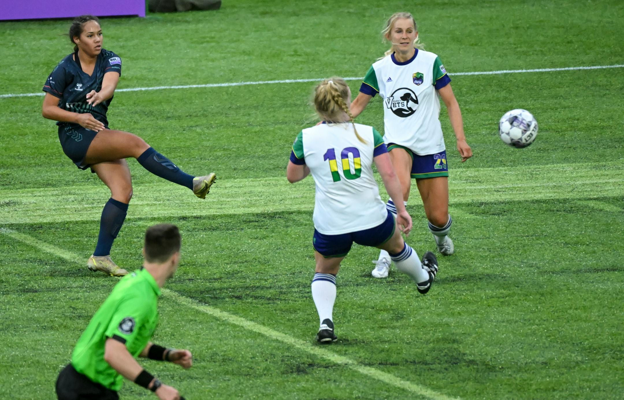 Minnesota's Shelby Hopeau scores a goal against Green Bay during the second half.