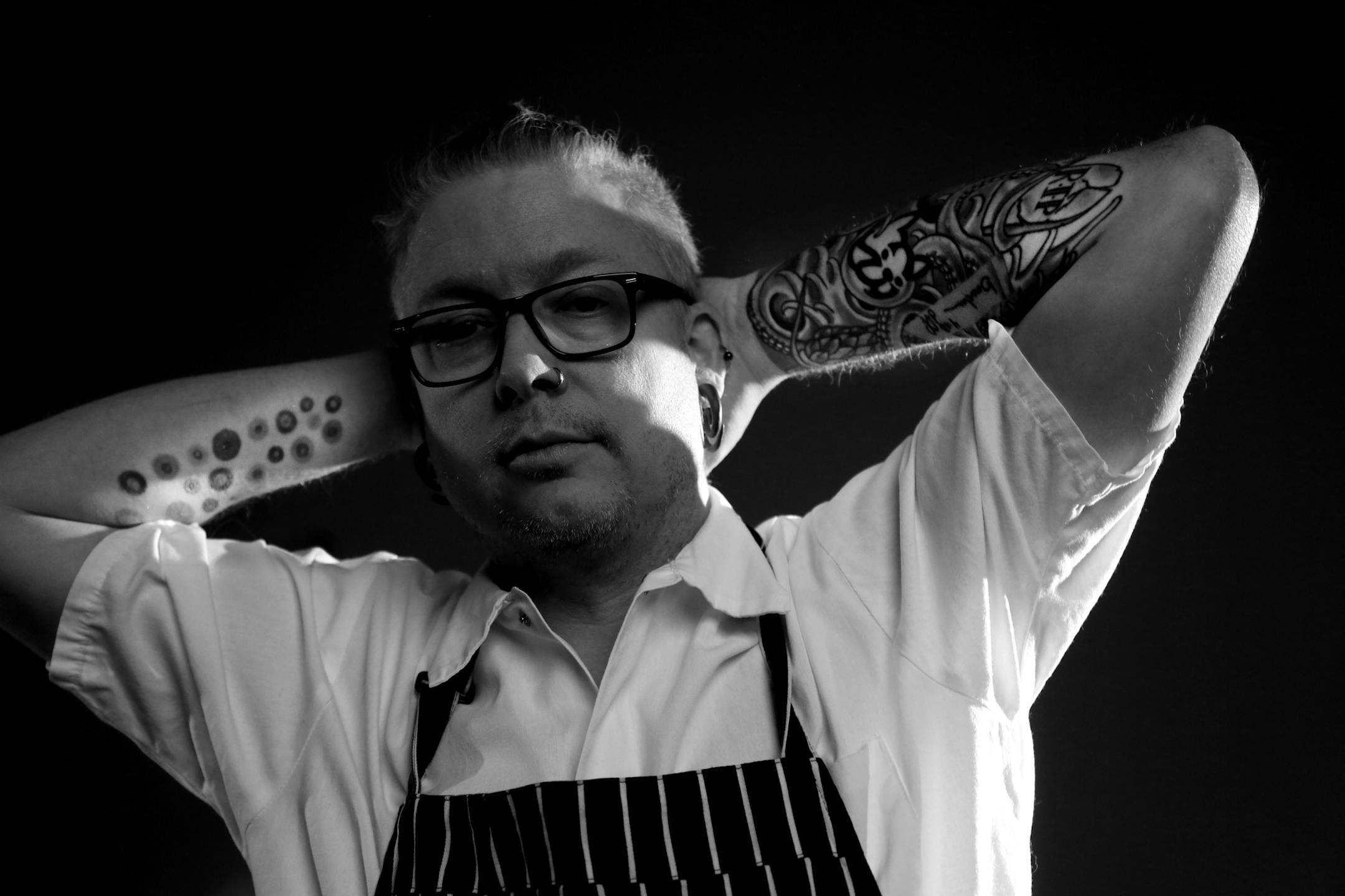 Doug Flicker of Piccolo for 010415 story on chefs with tattoos.