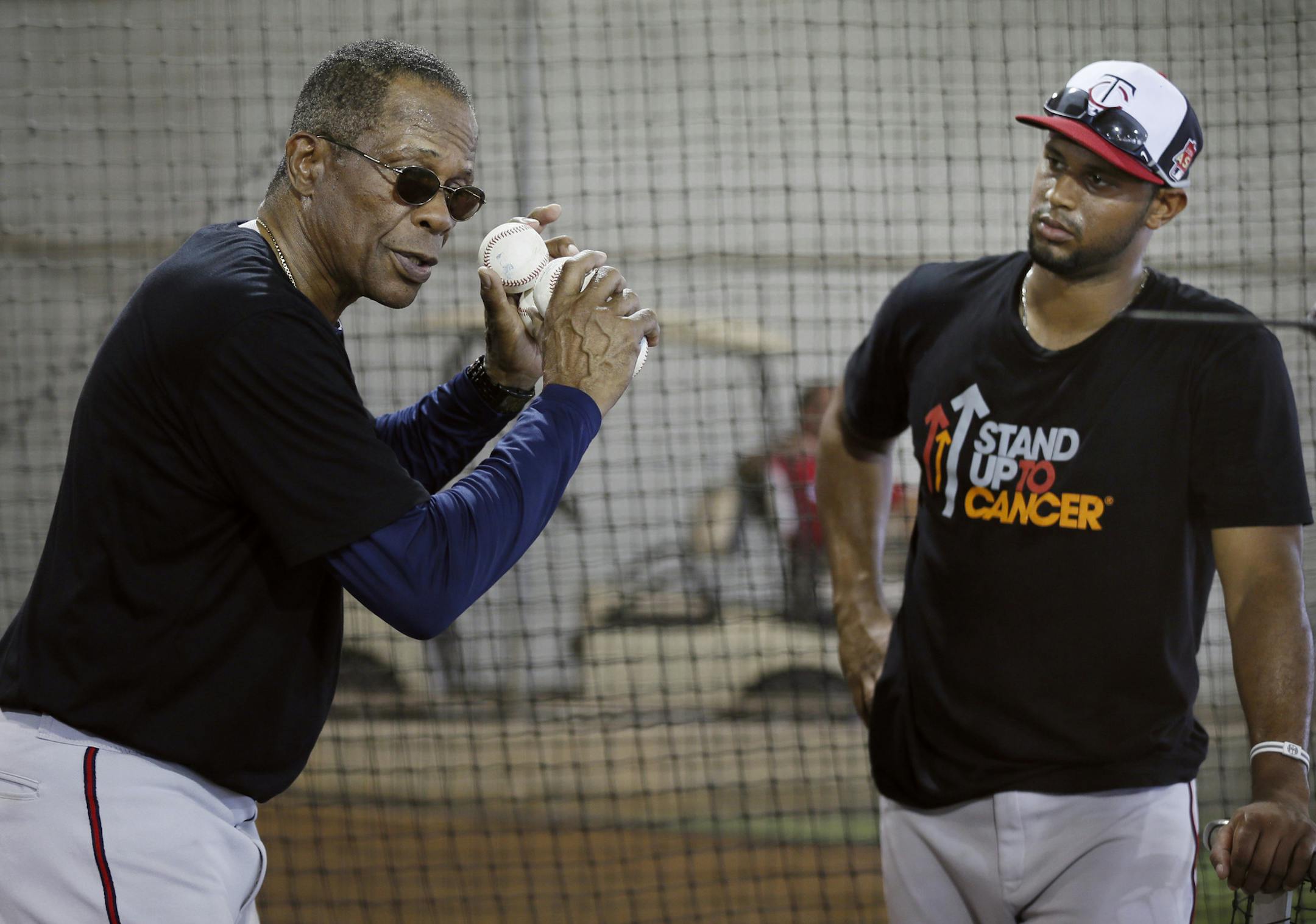 Twins hall of famer Rod Carew gave hitting instructions to Aaron Hicks during practice Saturday Feb 22. 2014 in Fort Myers, Florida at Lee County Sports Complex. ] JERRY HOLT jerry.holt@startribune.com Jerry Holt