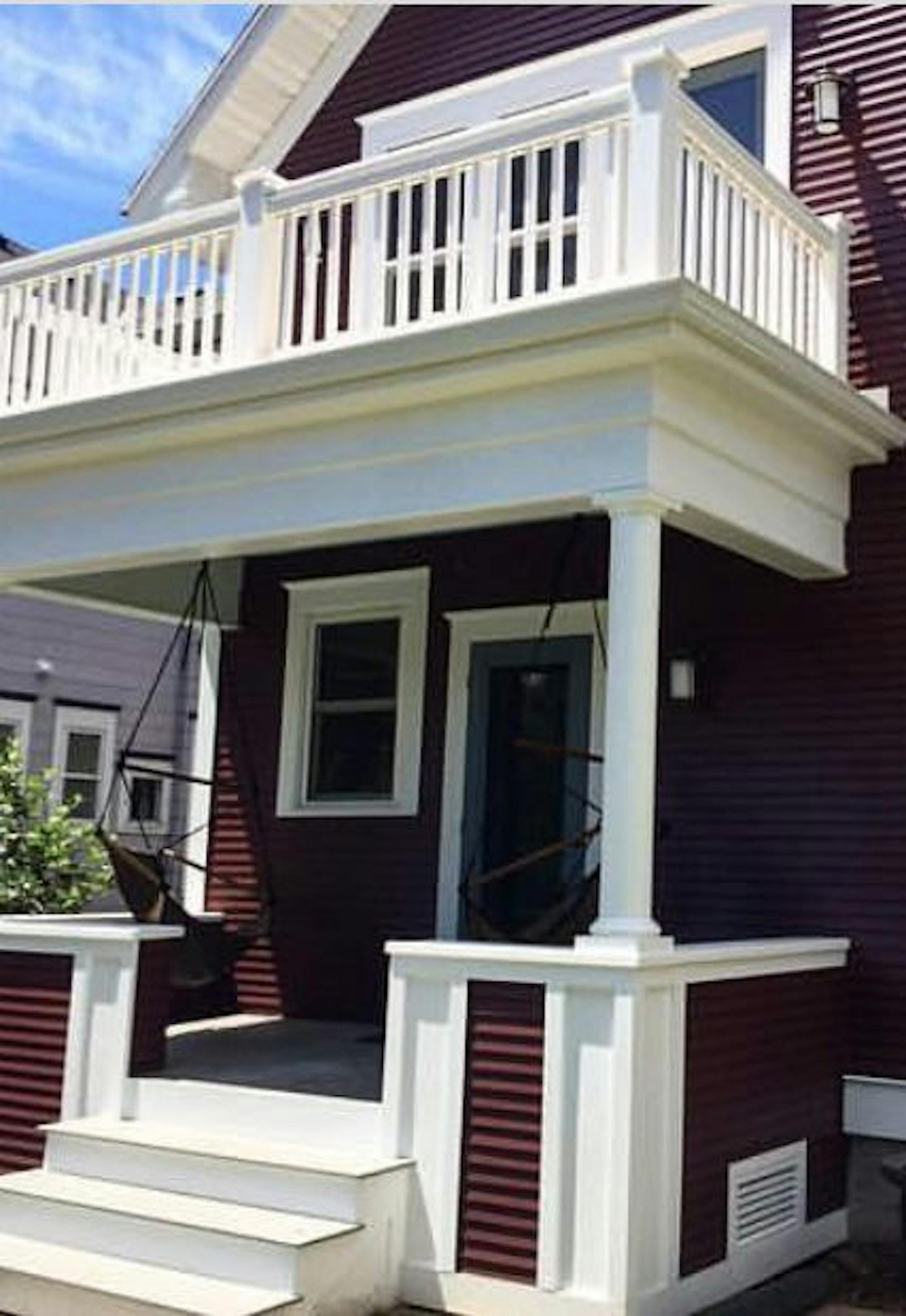 Porch and upper balcony addition by David Heide Design Studio.